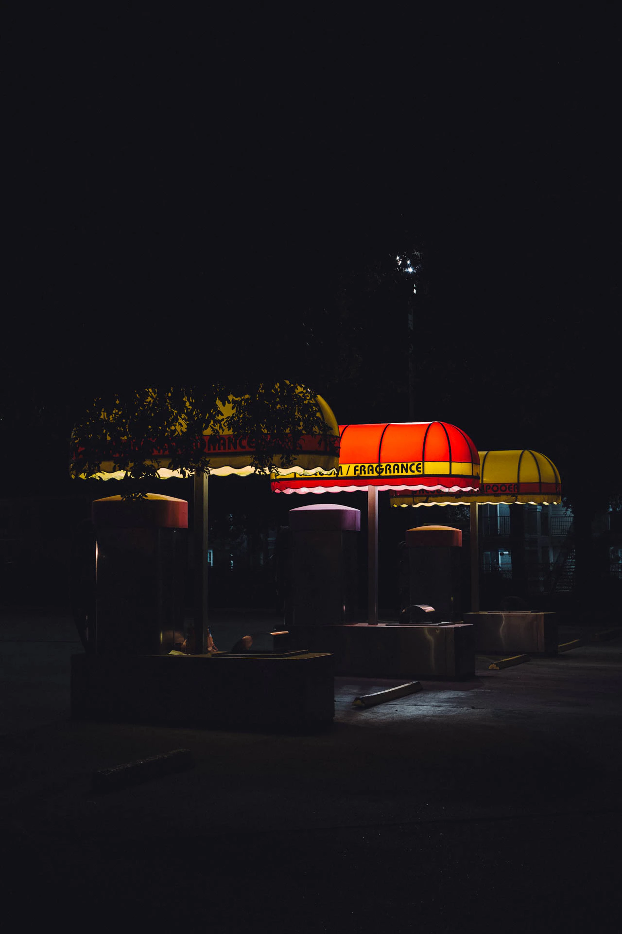 Retro Red Awning Car Wash at Night