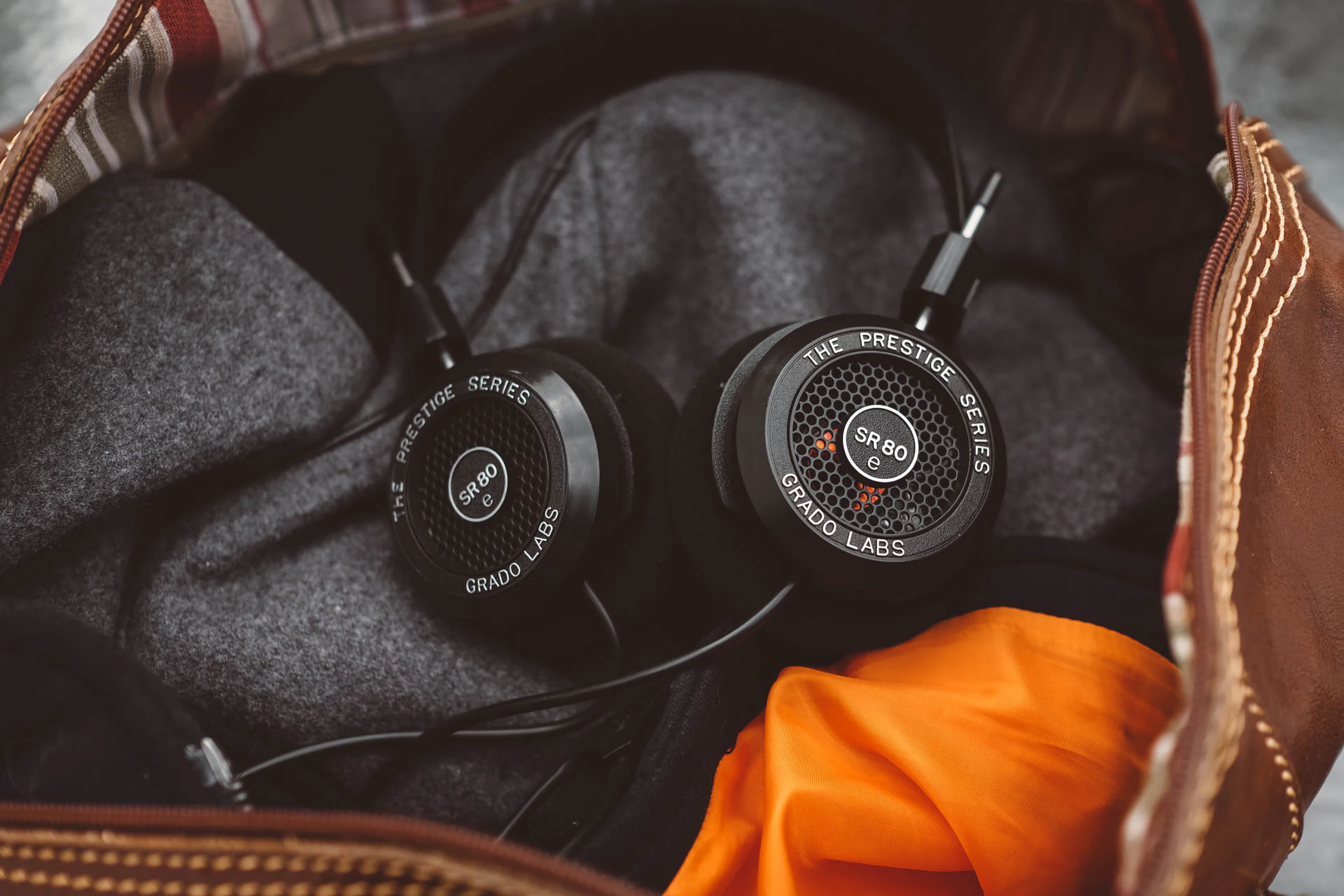 Grado Labs SR80e headphones in leather bag
