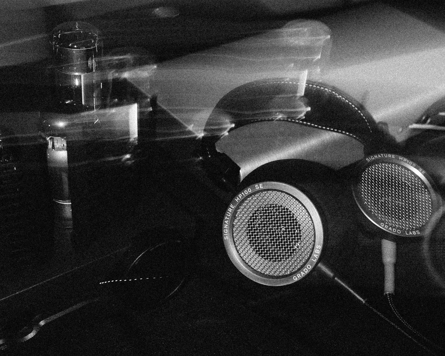 Grado Labs HP100 SE metal Headphones with amps in black and white