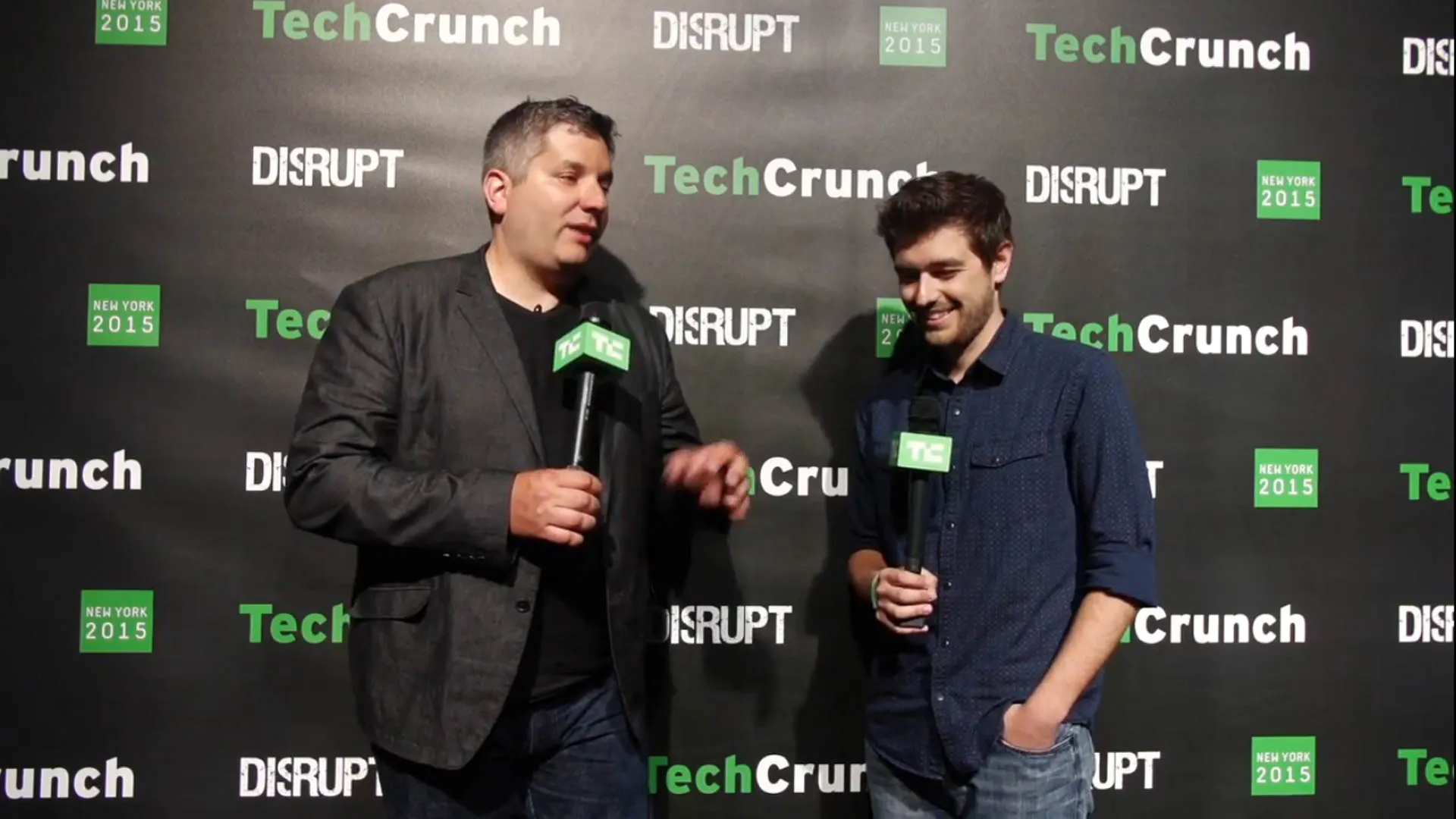 John Biggs and Jonathan Grado speaking backstage at TechCrunch Disrupt