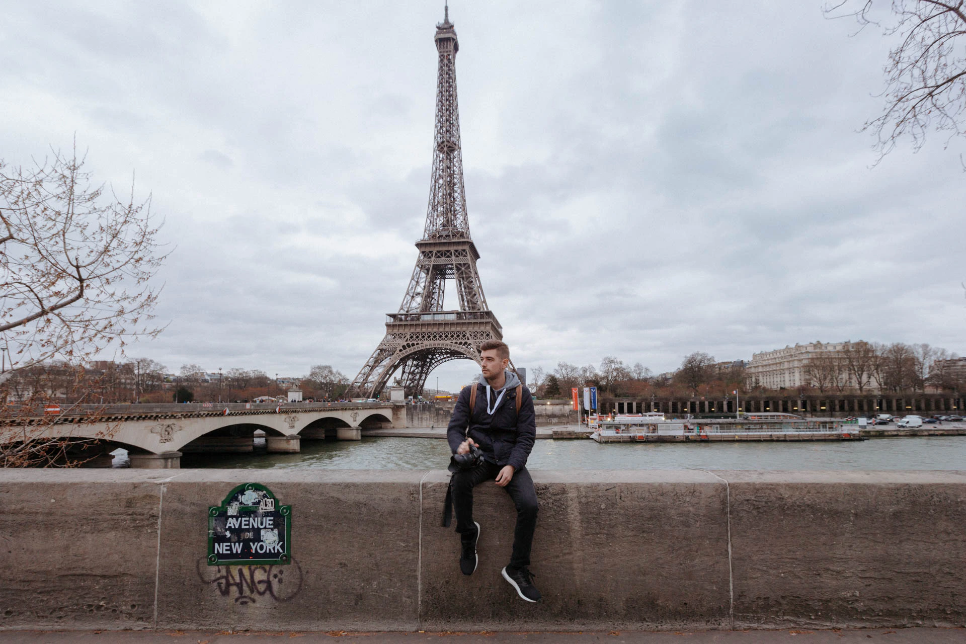 Jonathan Grado in front of Eiffel Tower in Paris