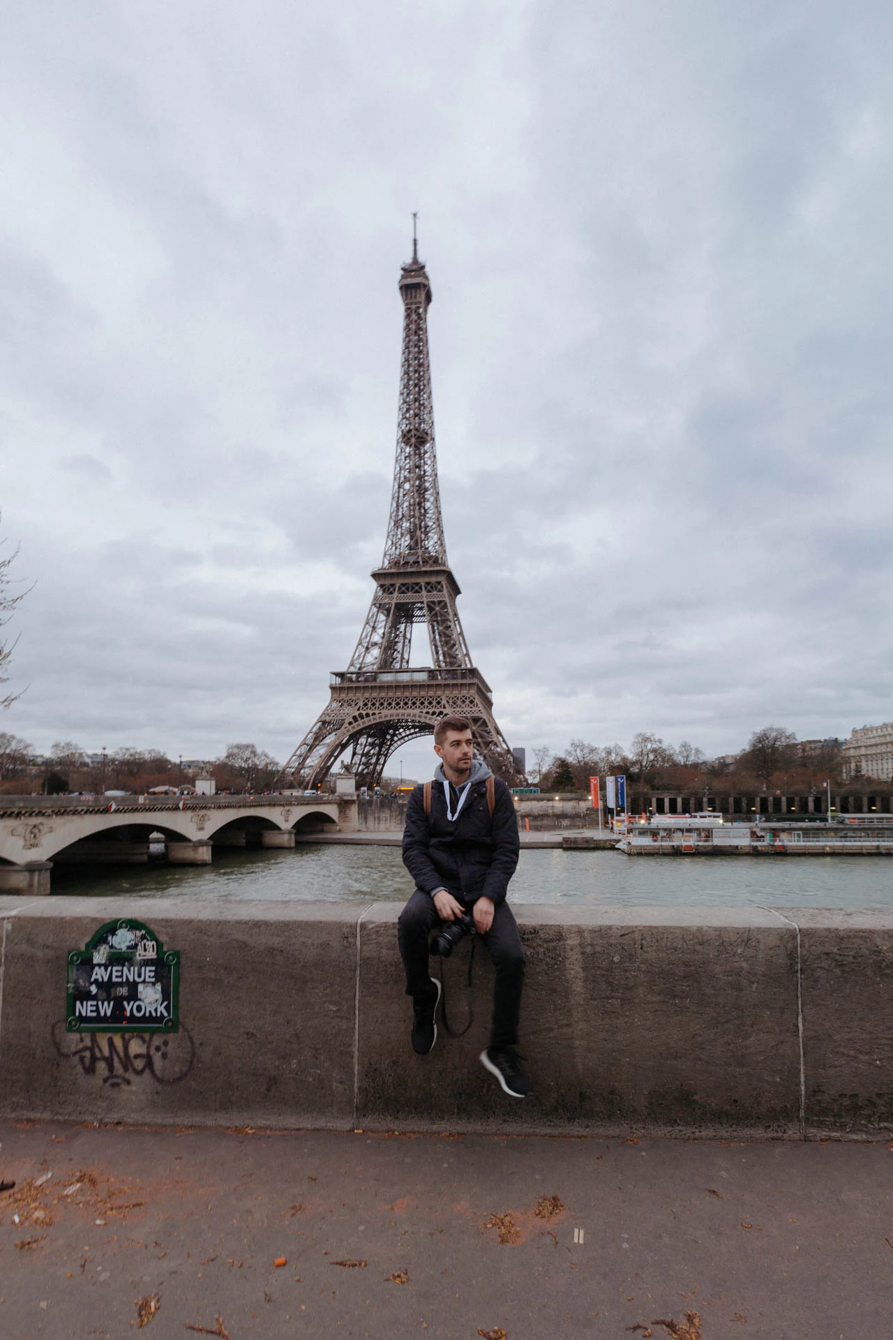 Jonathan Grado in front of Eiffel Tower in Paris