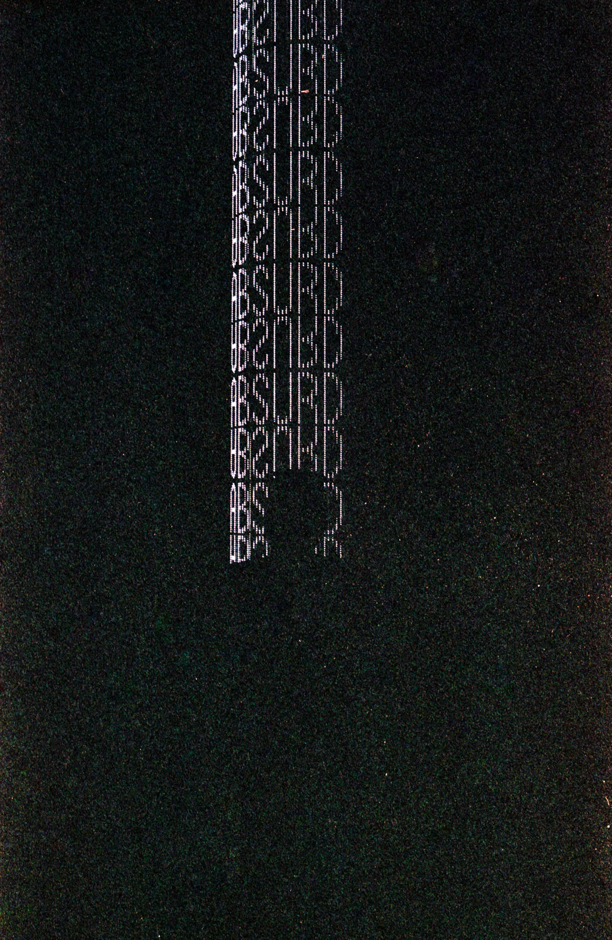 The word absurd repeating in neon on film