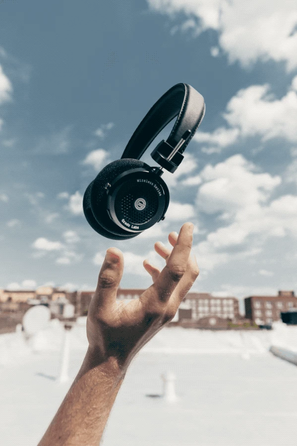 GW100 wireless grado headphones levitating in a hand
