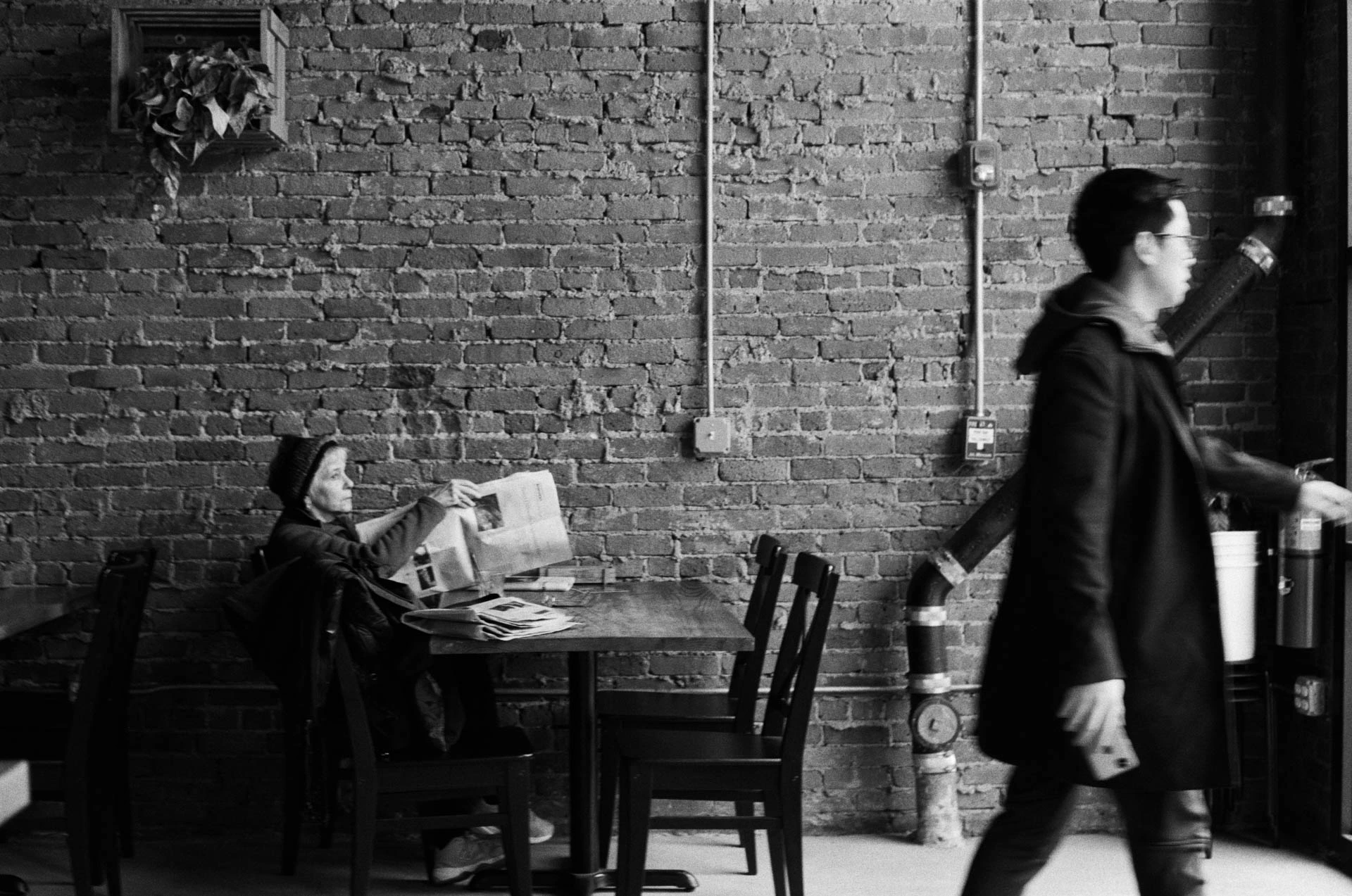 man walking in coffee shop on film