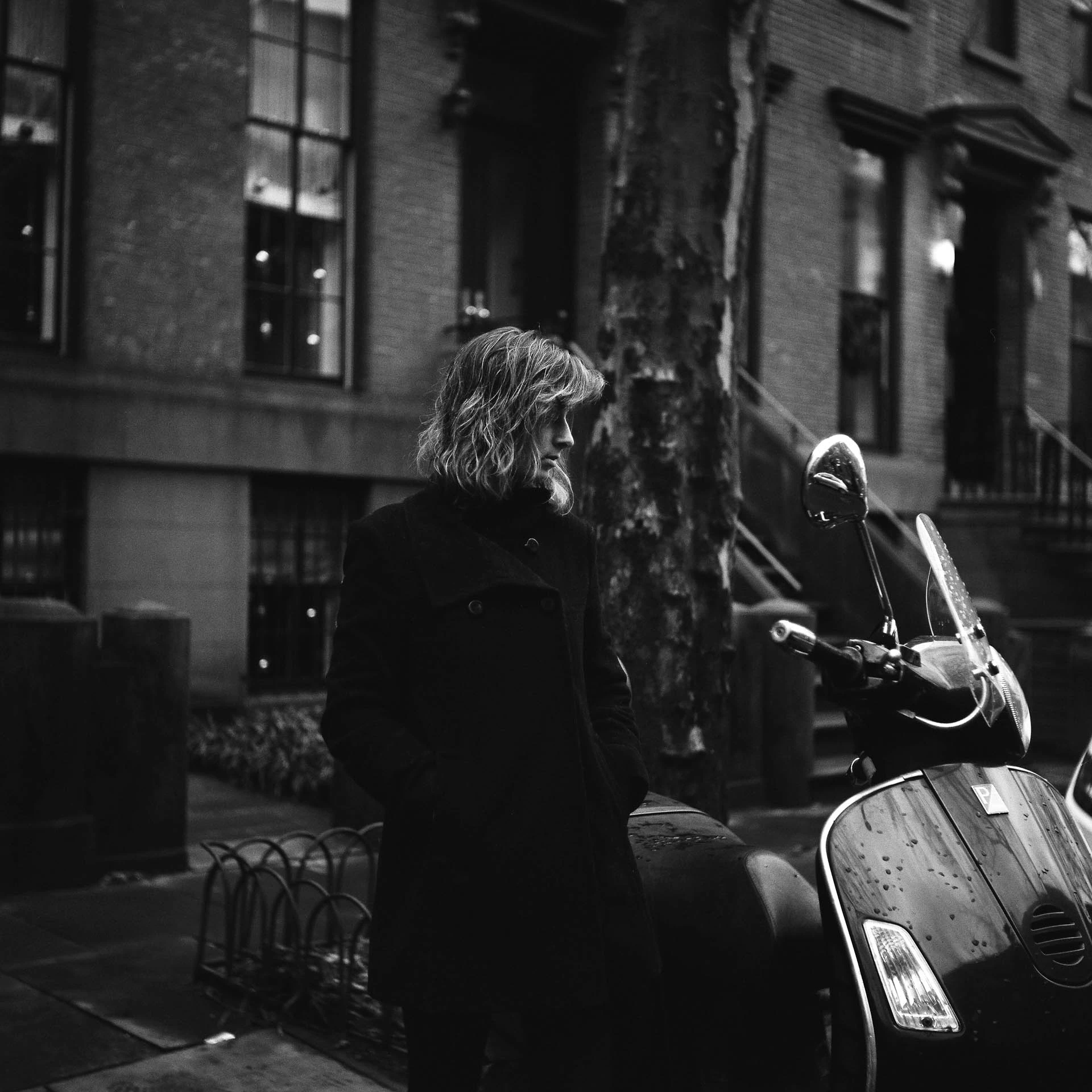 woman portrait on film with motorcycle