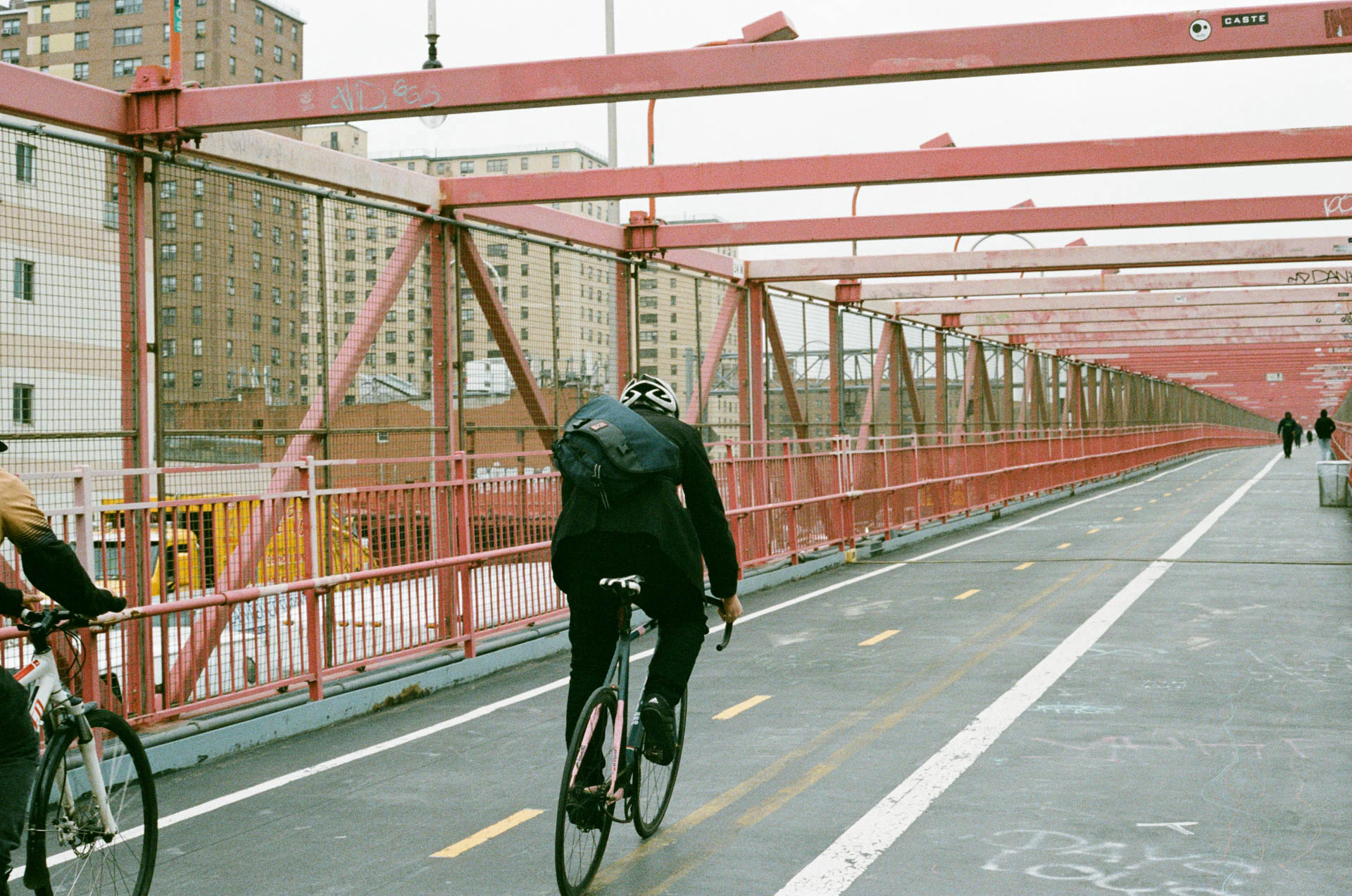biker on Williamsburg bridge on film