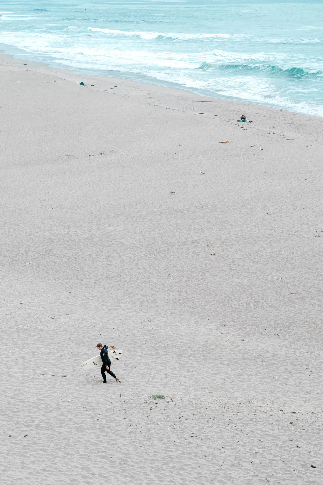 man walking the beach