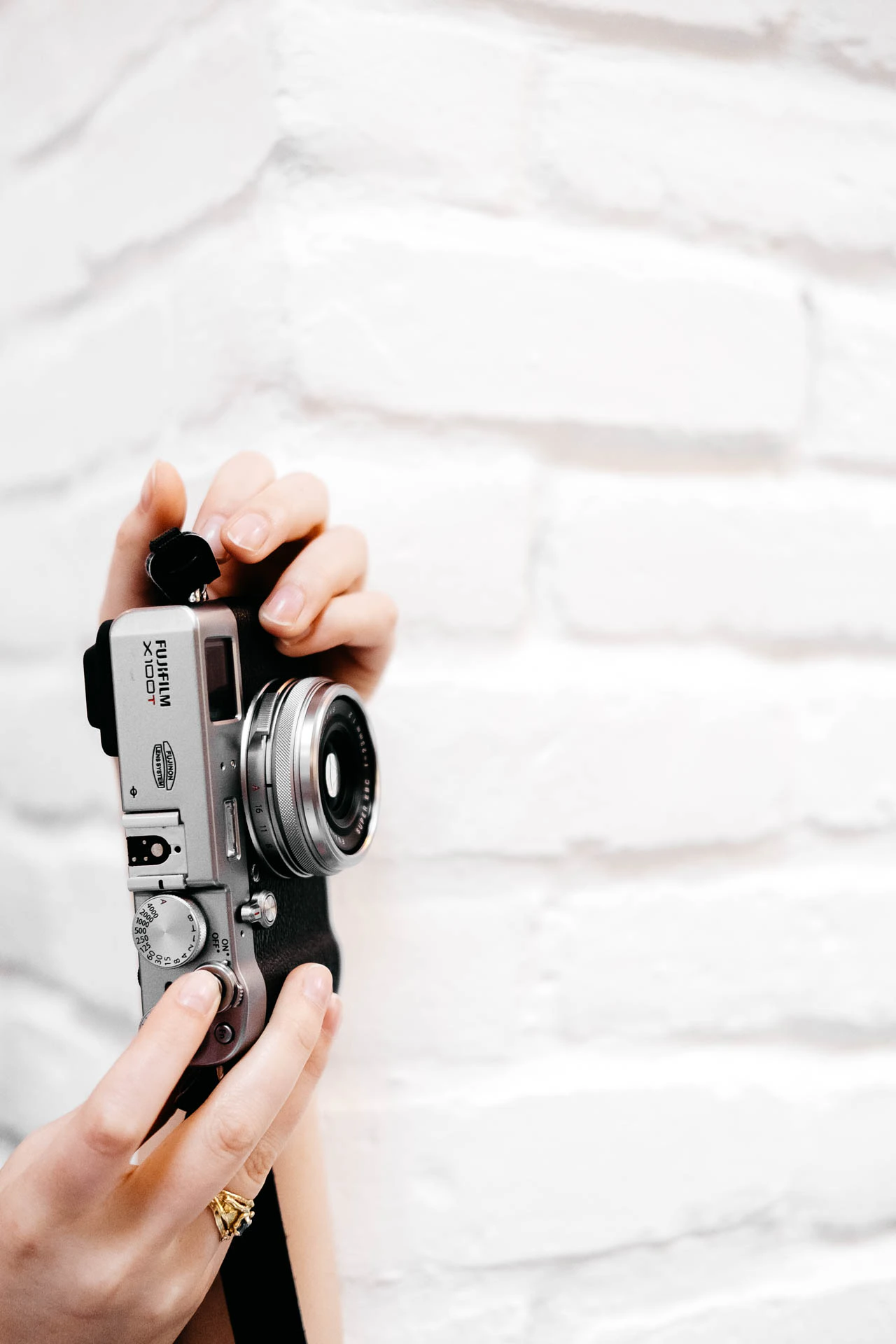 hands holding fujifilm x100t