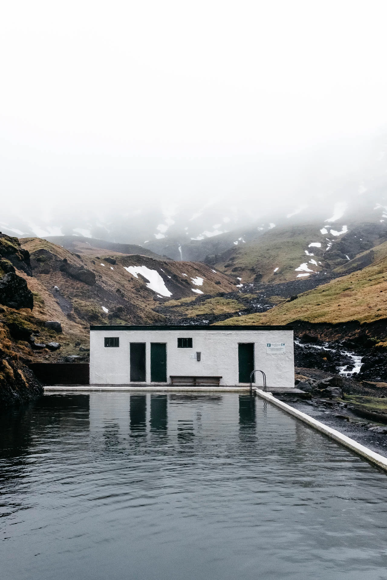 Seljavellir pool in Icelandic mountains