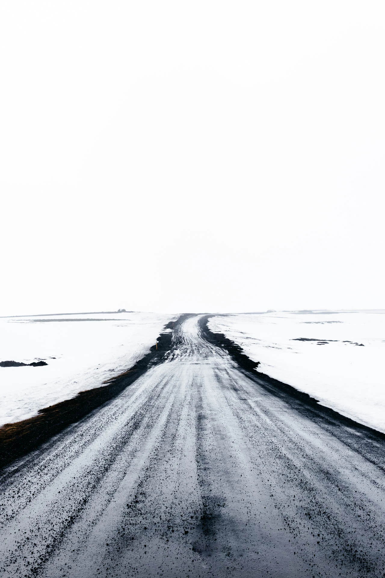 long icy road in iceland