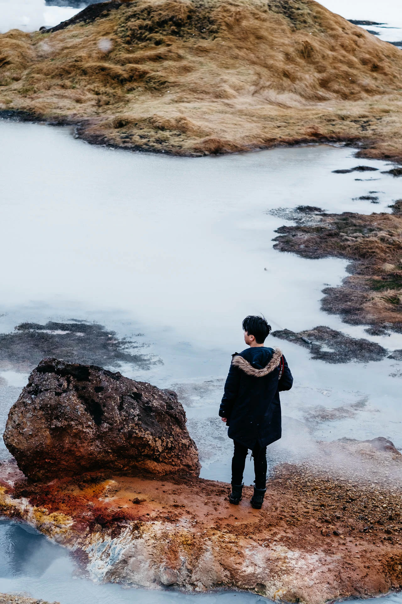 man at Icelandic hot springs