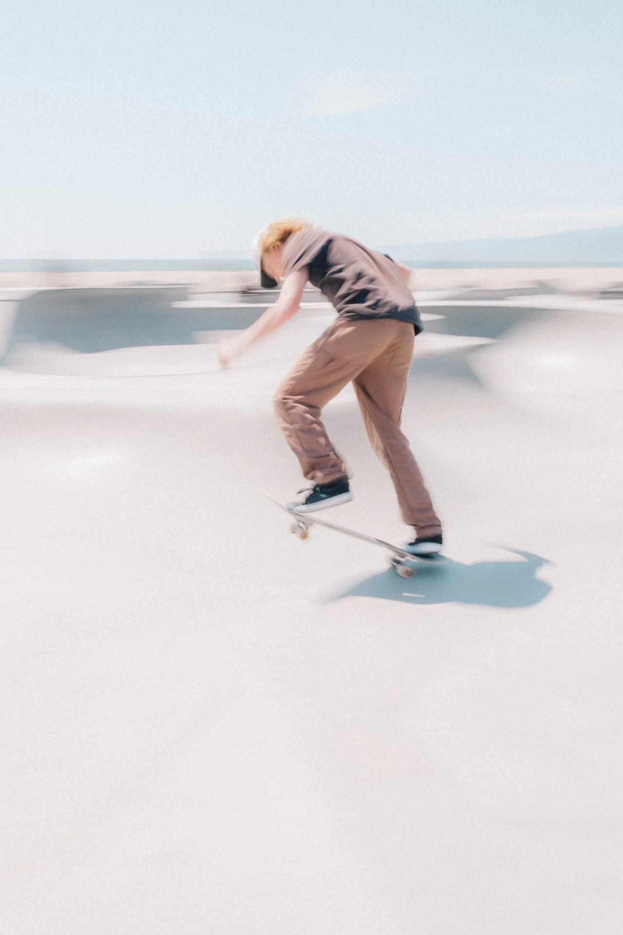skateboarder in motion at venice beach