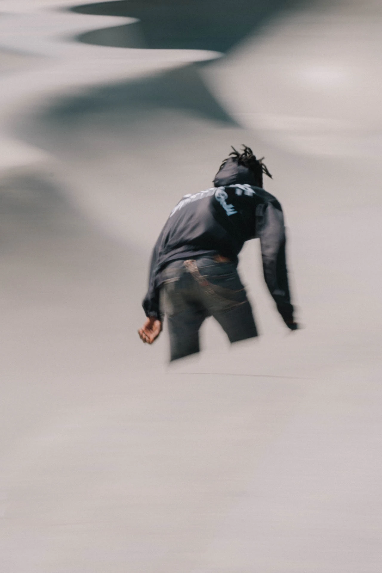 skateboarder in motion at venice beach