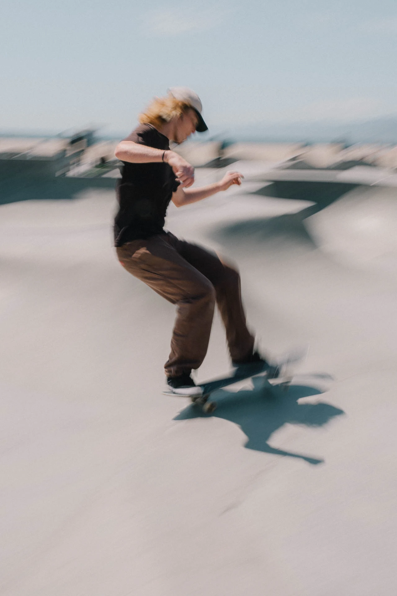 skateboarder in motion at venice beach