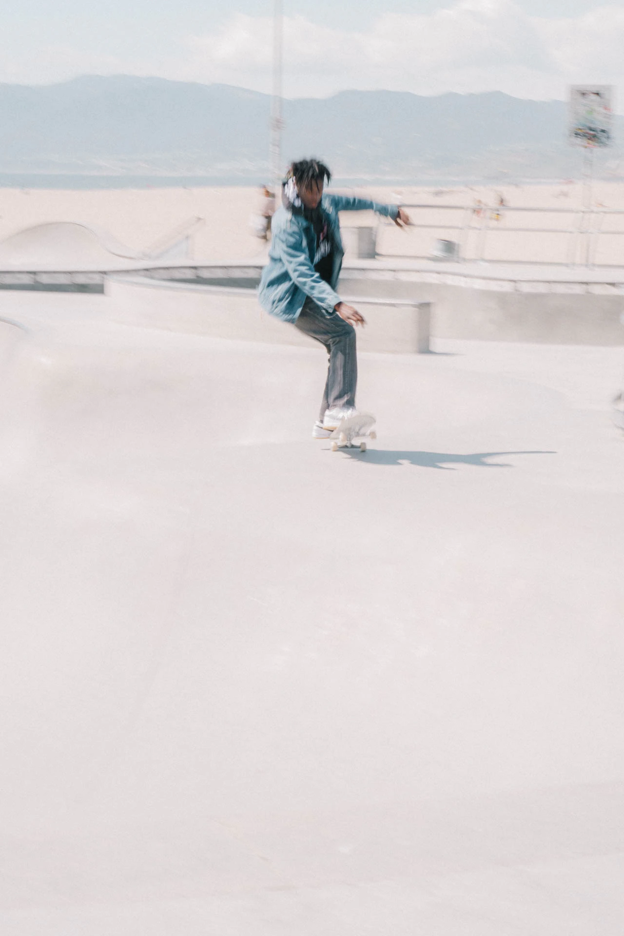 skateboarder in motion at venice beach