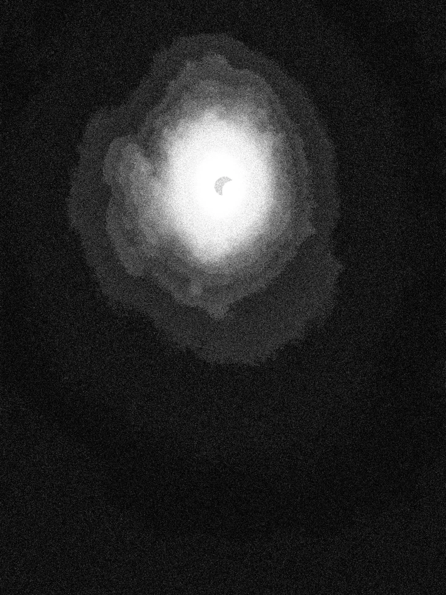 total eclipse 2024 taken with iPhone in black and white