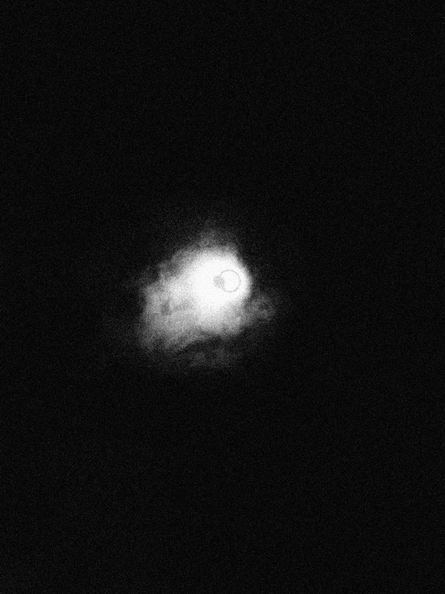 total eclipse 2024 taken with iPhone in black and white
