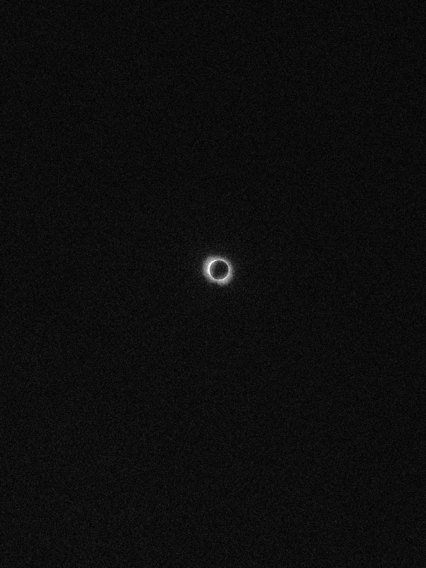 total eclipse 2024 taken with iPhone in black and white