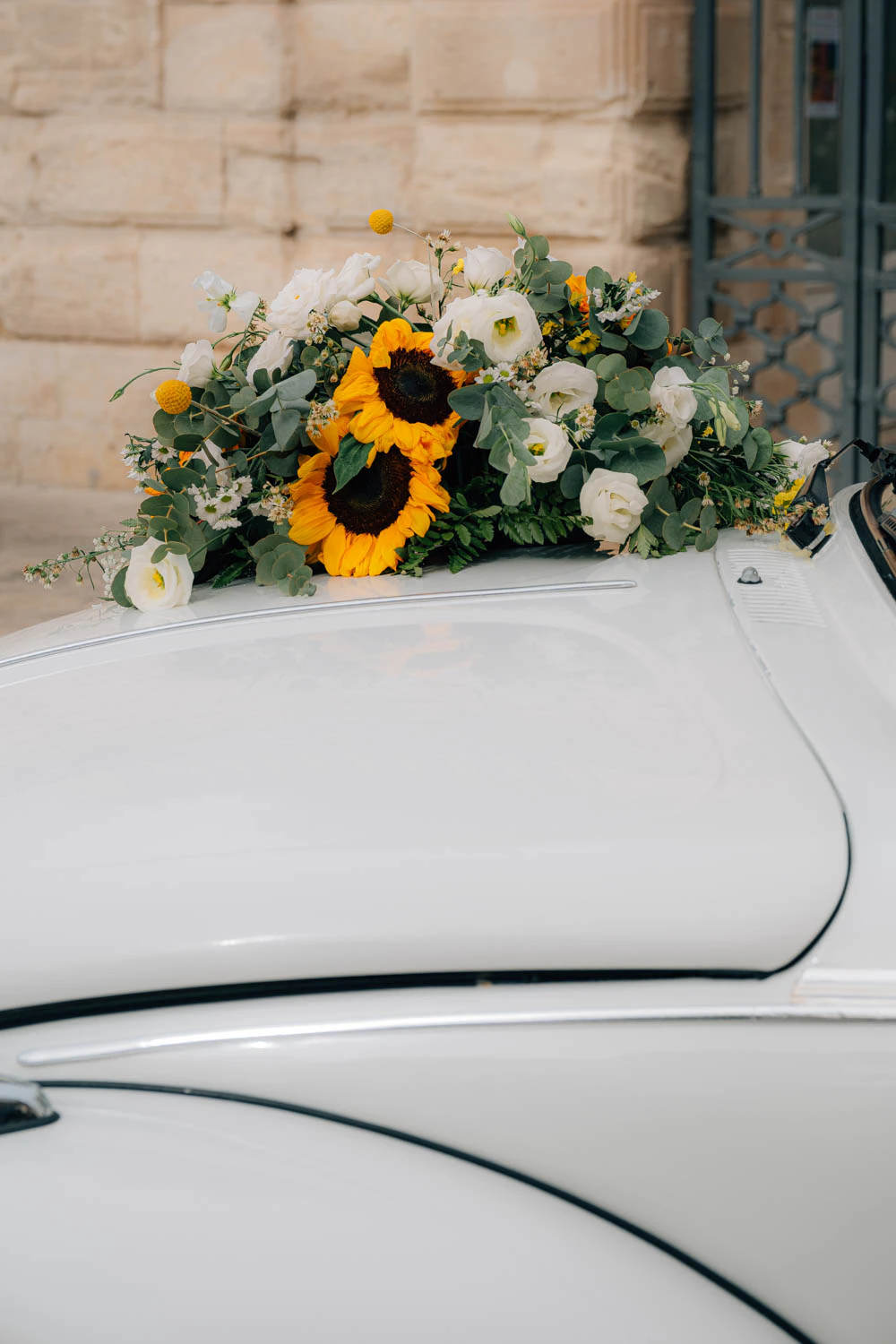 sunflowers on old car in Sicily