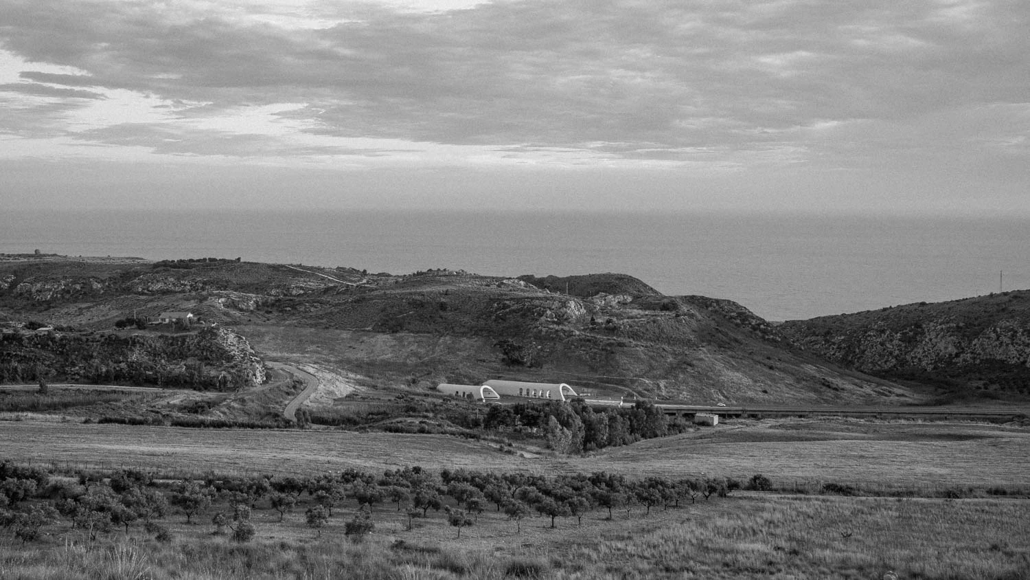 black and white mountain highway on the coast in Sicily