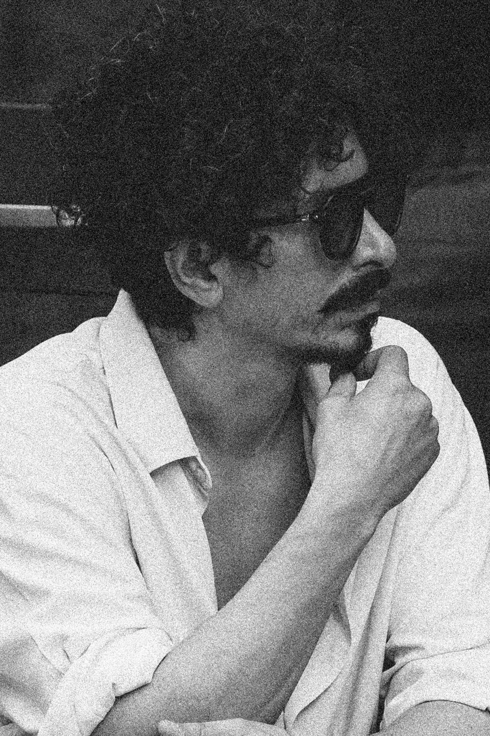 black and white man waiting for espresso in Palermo