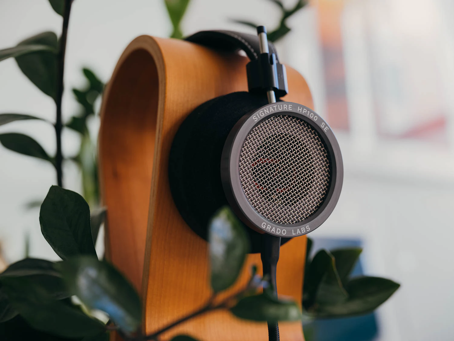 Grado HP100 SE headphones shot on Fujifilm gfx100s ii with plants and headphone stand
