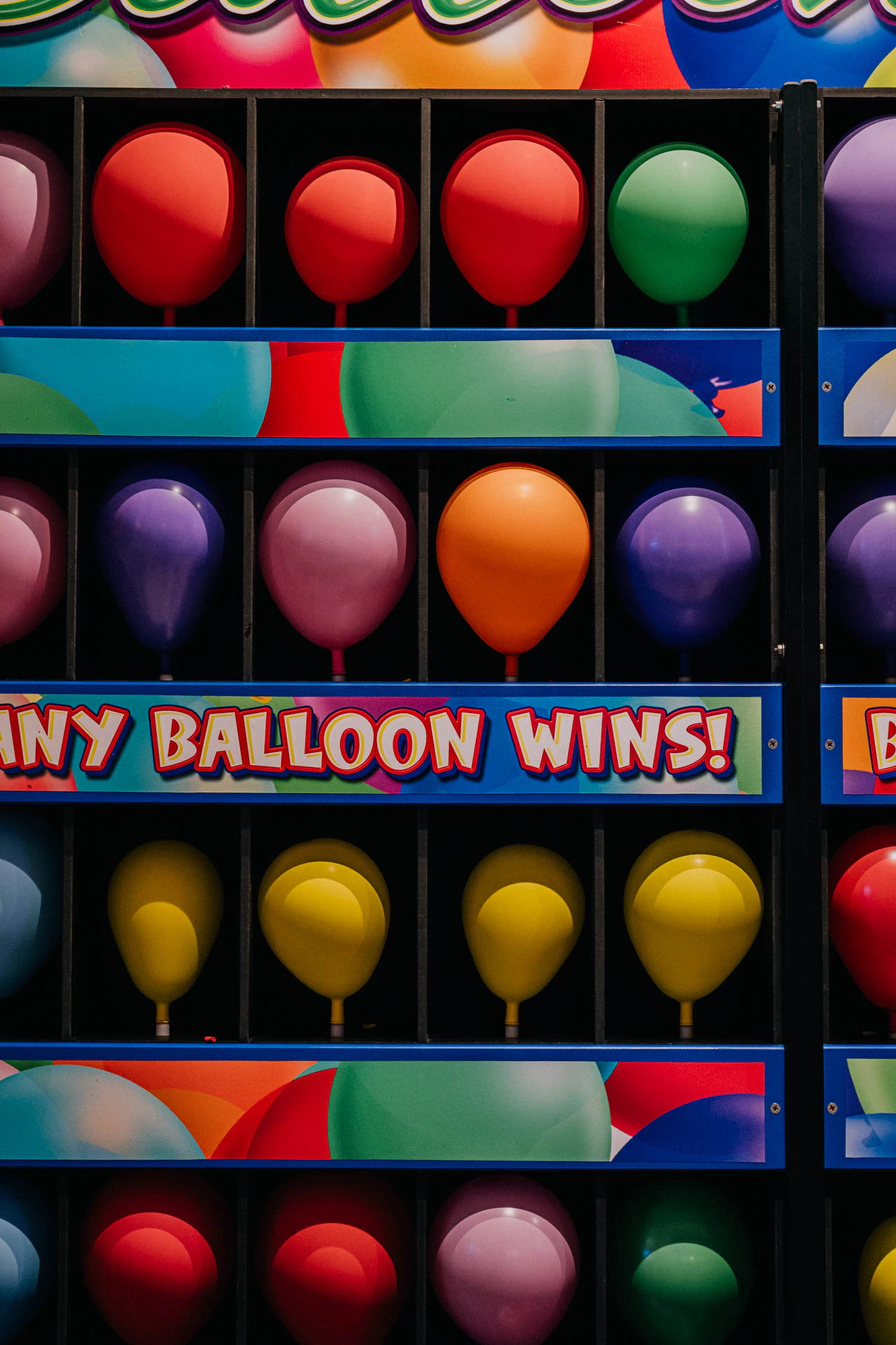 fantasy island amusement park balloon game