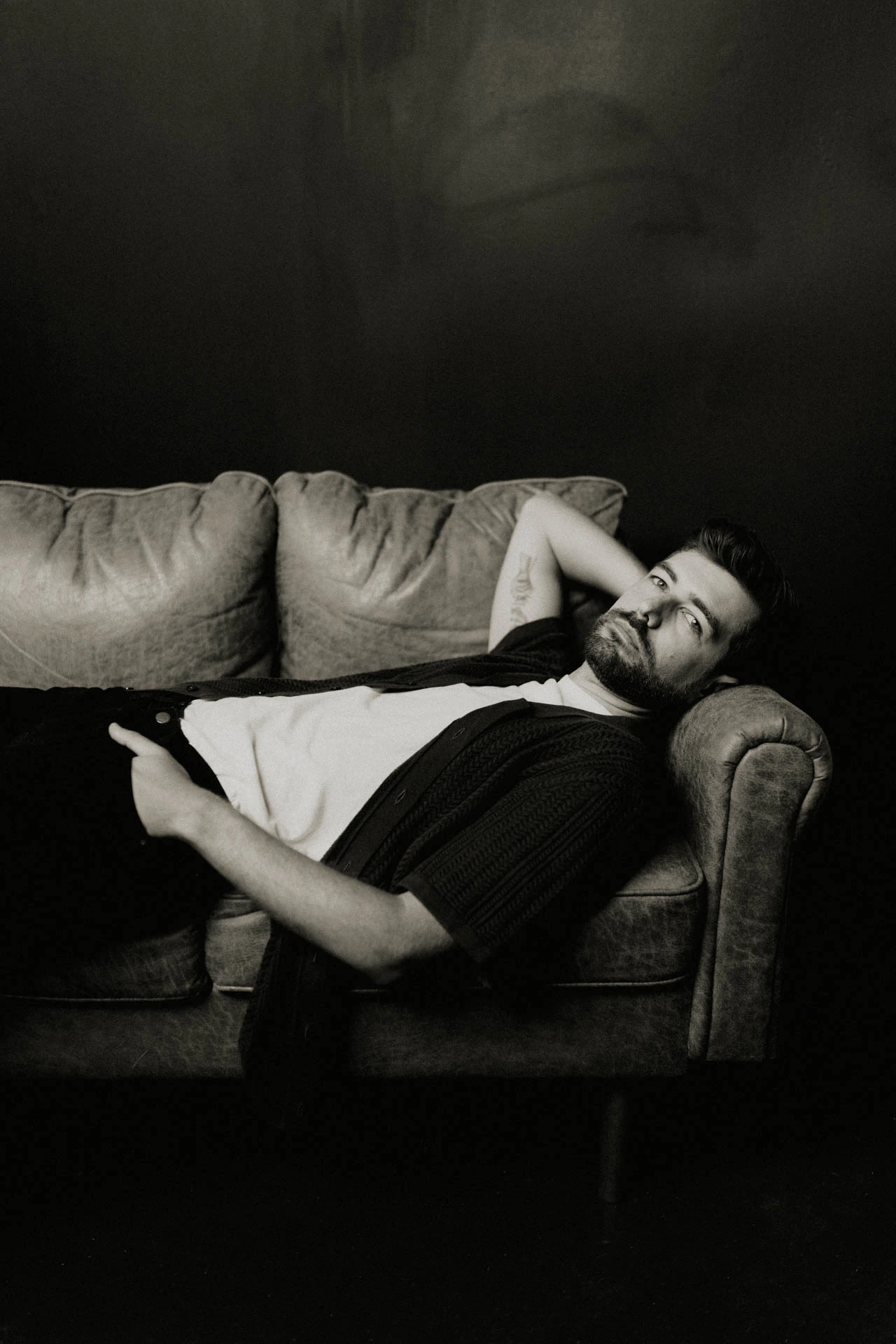 portrait of Jonathan Grado on a couch