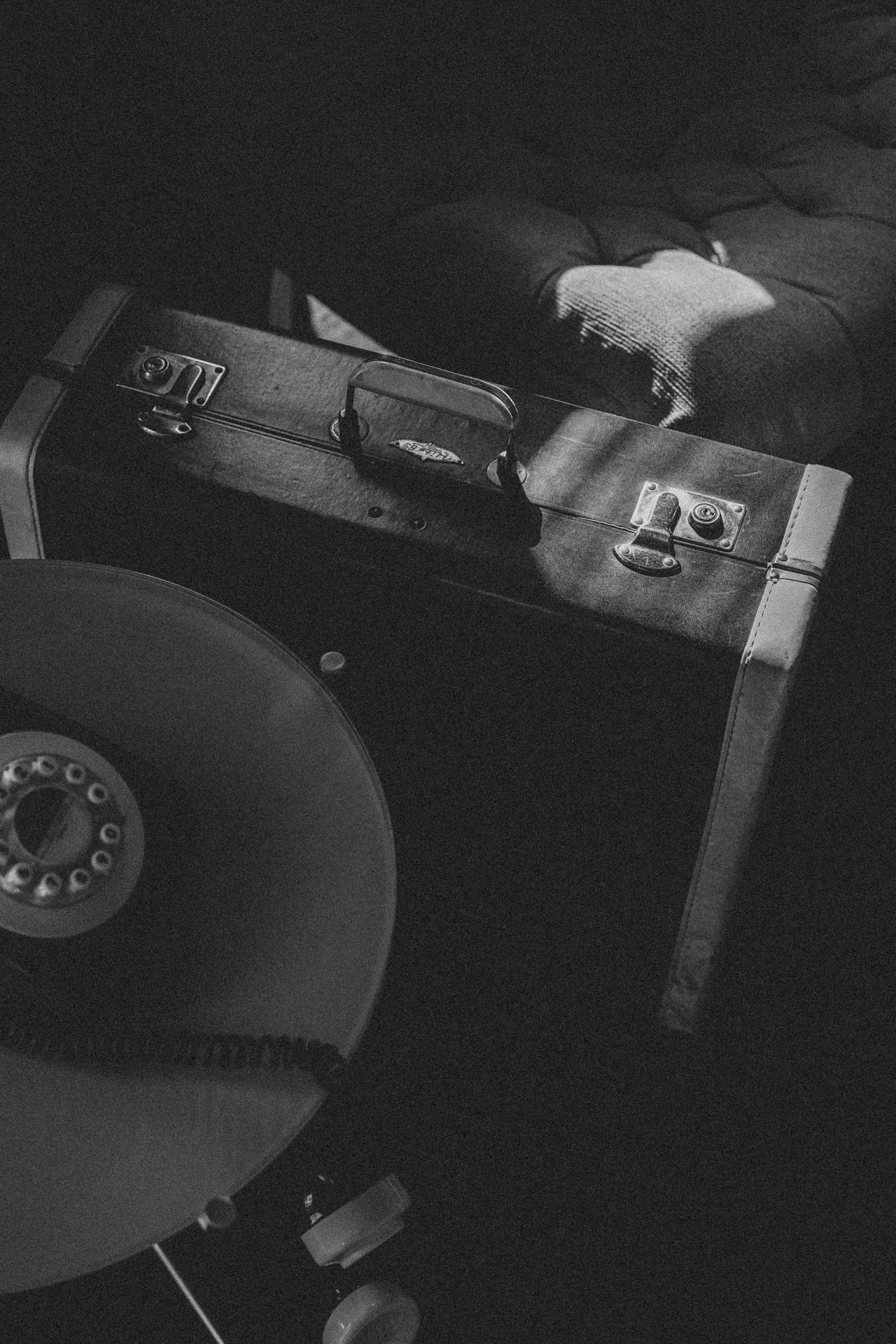 black and white rotary phone and luggage in Santa monica hotel during sunset