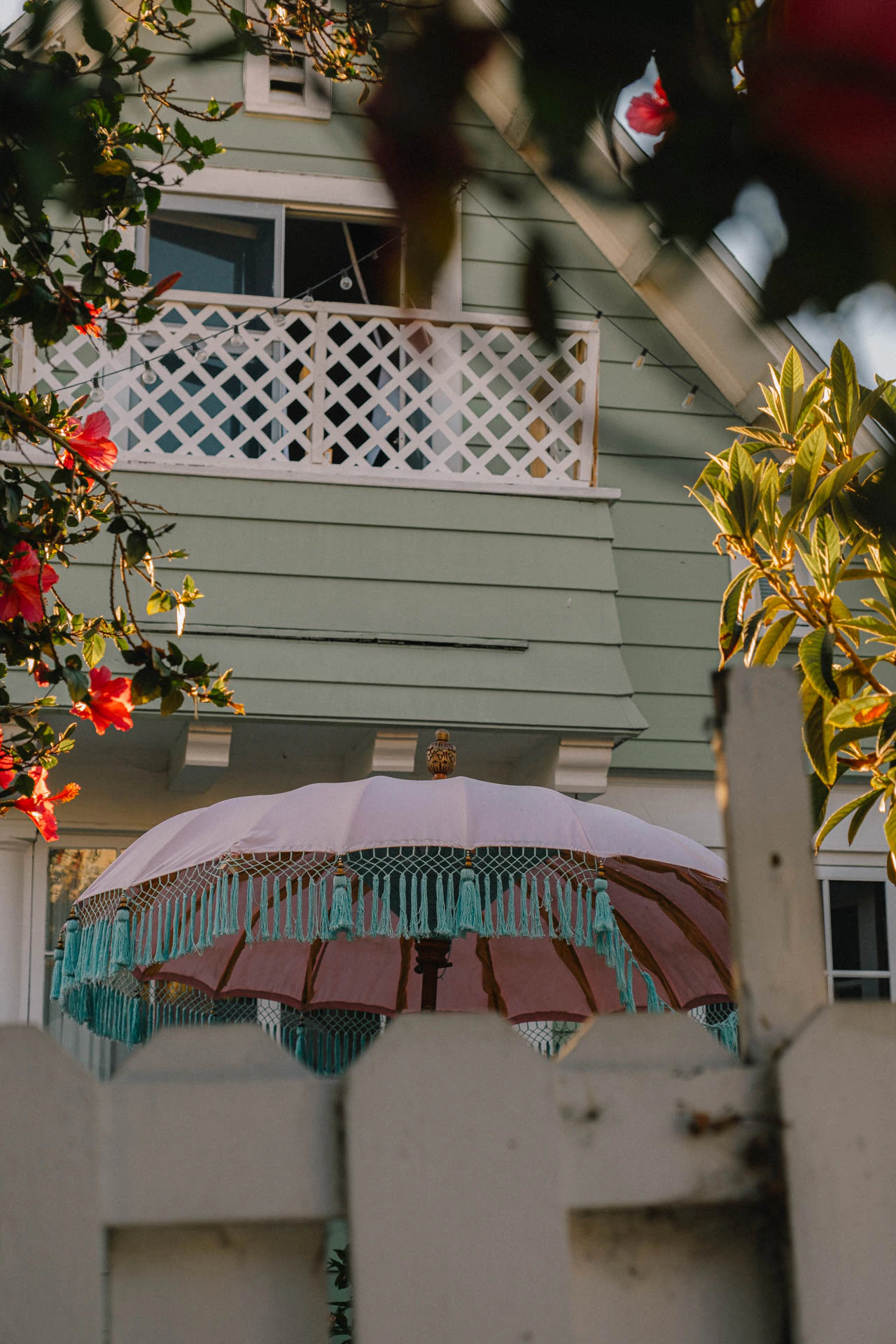pink umbrella at sunset in Venice Beach