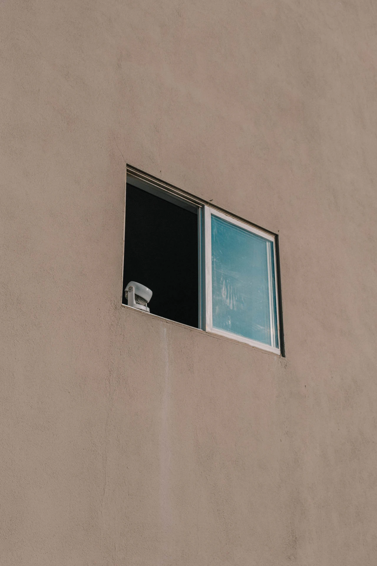 a fan in a window in Venice Beach