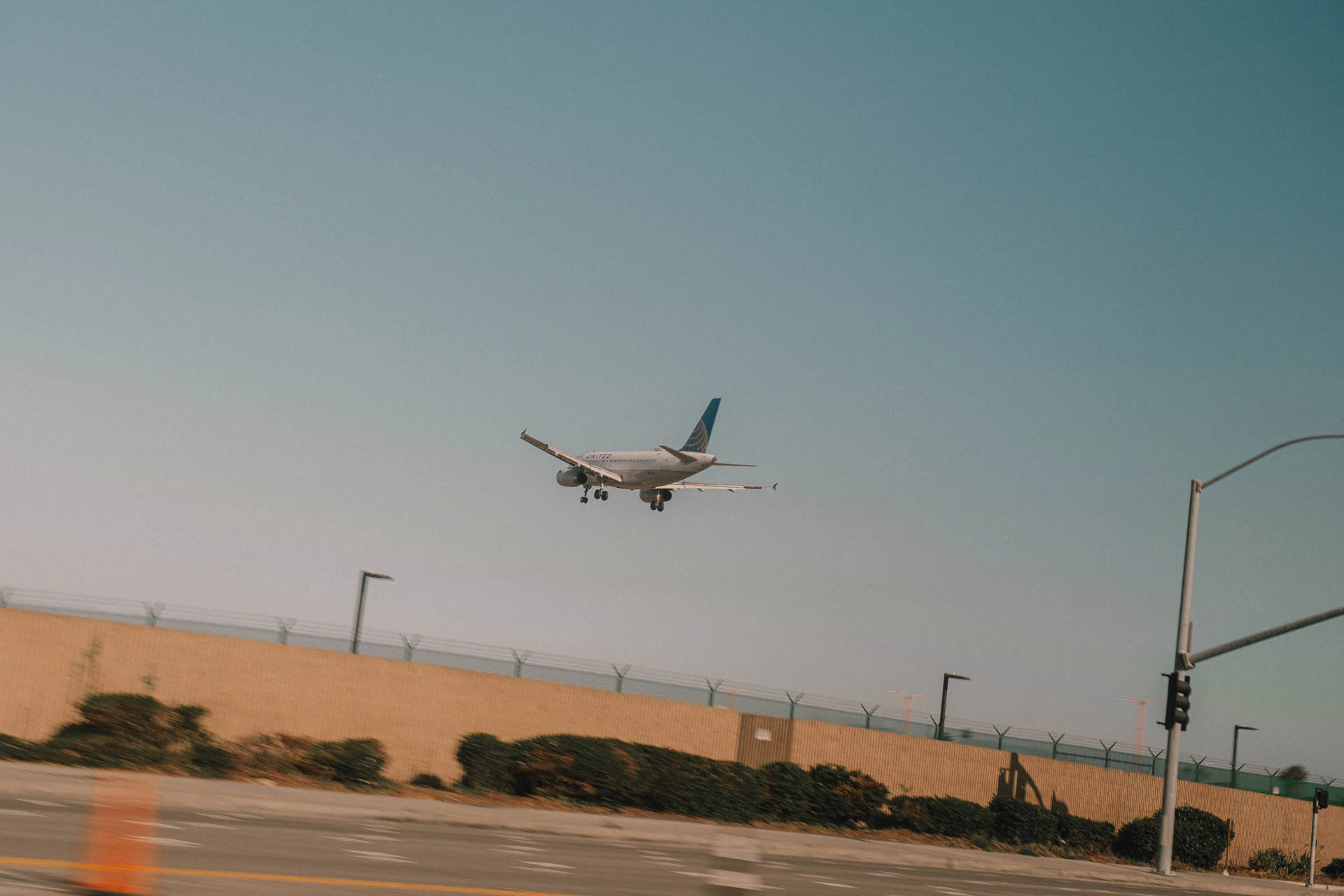 plane landing at sunrise in Los Angeles