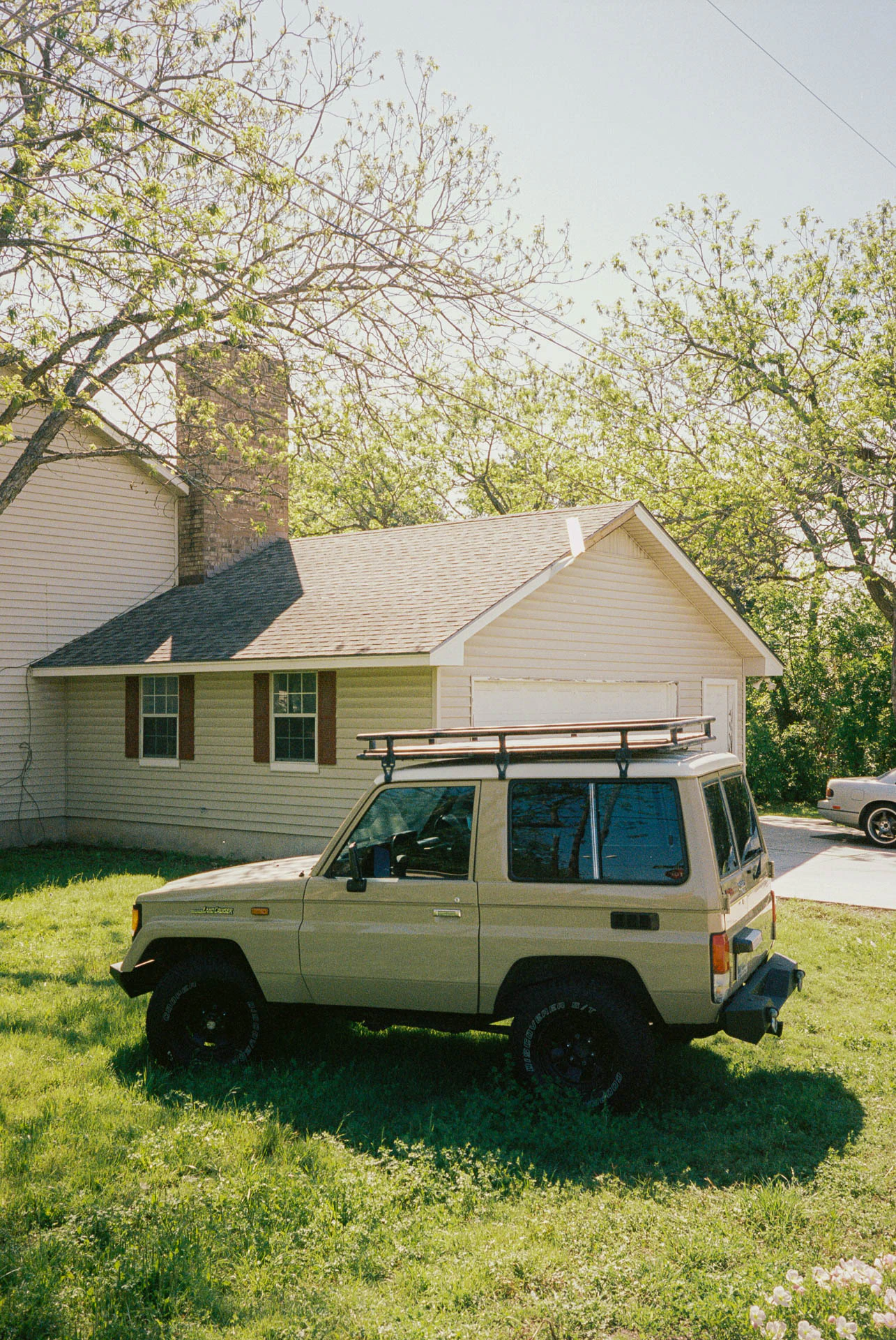 jeep in a driveway in round rock Texas on film