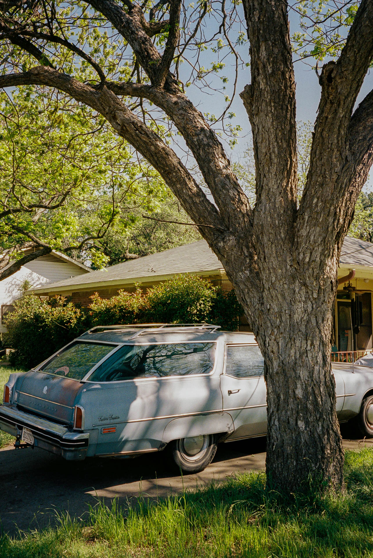 car in a driveway in round rock Texas on film