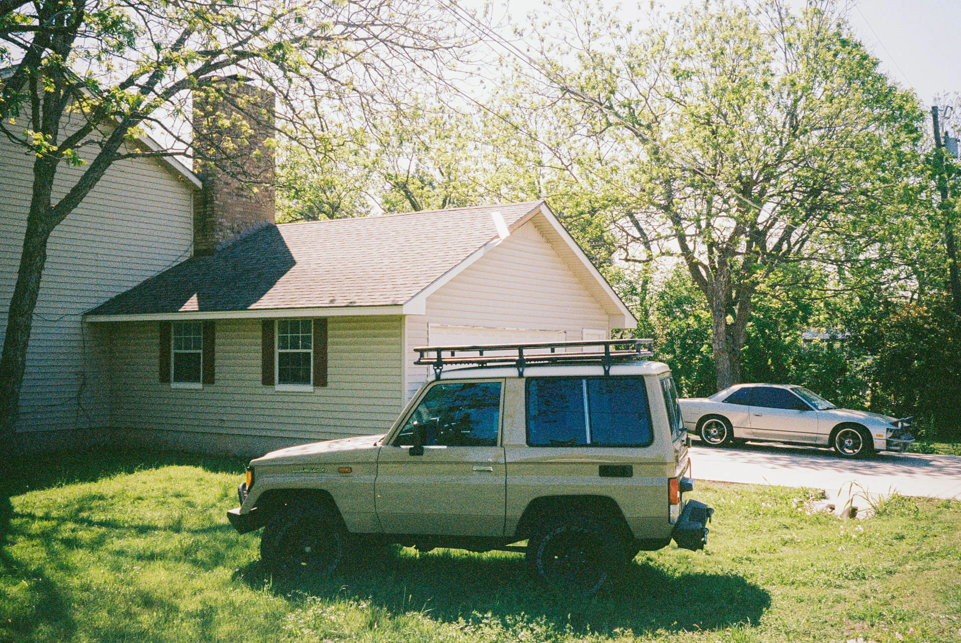 jeep in a driveway in round rock Texas on film