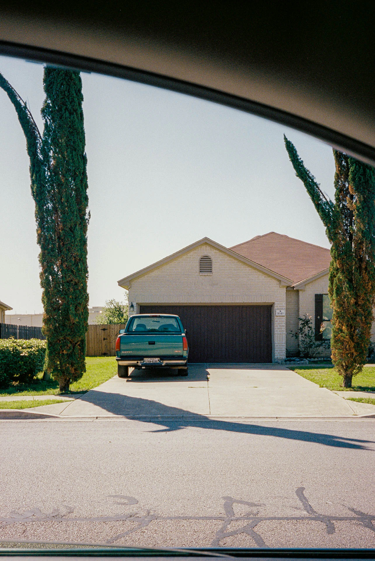 truck in a driveway in round rock Texas on film