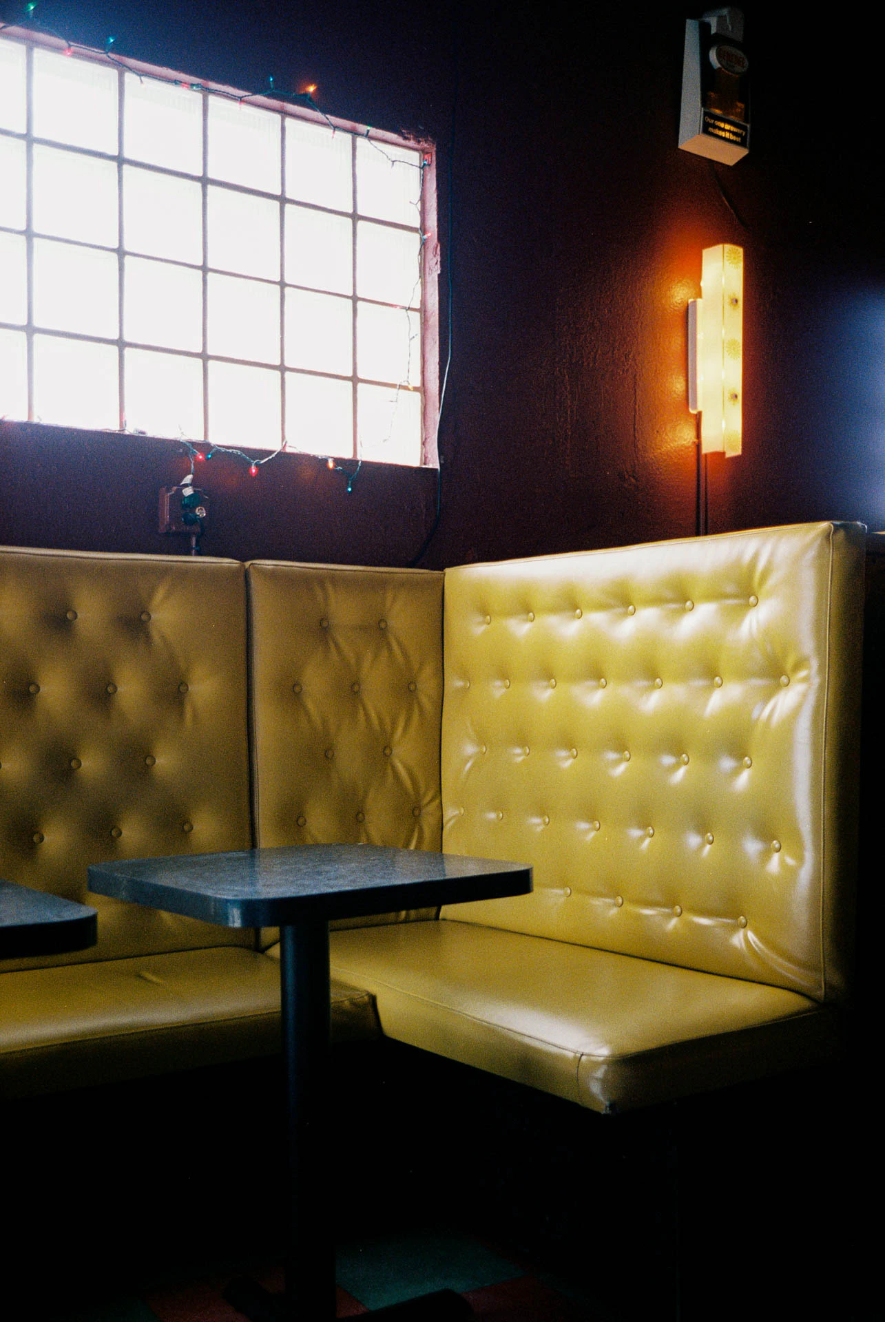 yellow booth at nickel city in Austin, Texas on film
