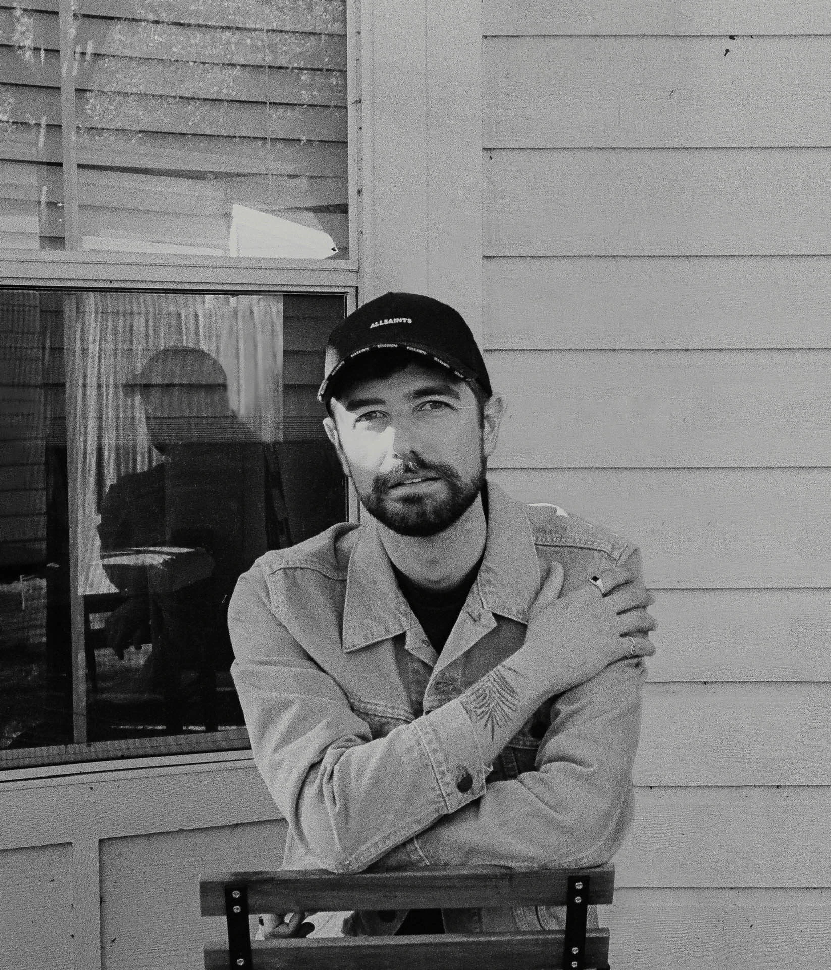 Jonathan Grado portrait in black hat on tri x 400 black and white film