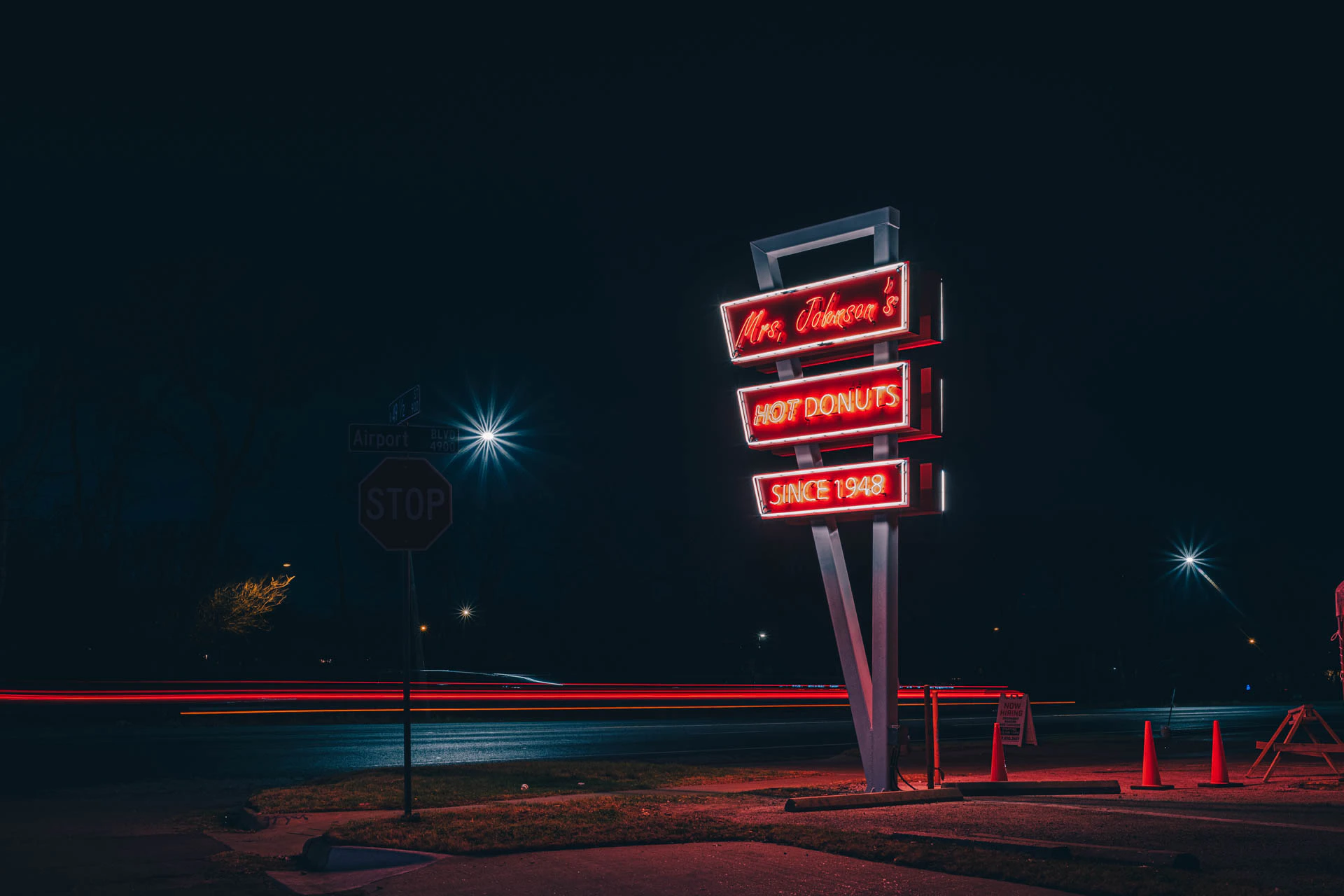 mrs Johnsons hot donuts neon sign in Austin Texas at night