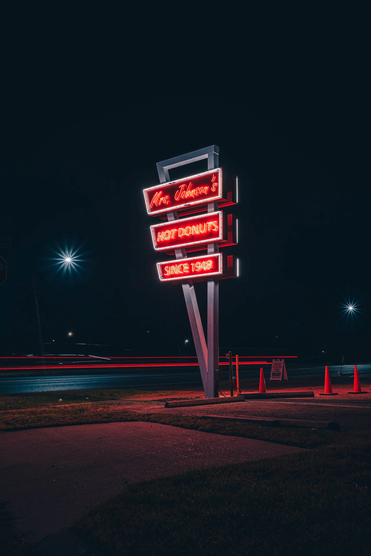 mrs Johnsons hot donuts neon sign in Austin Texas at night