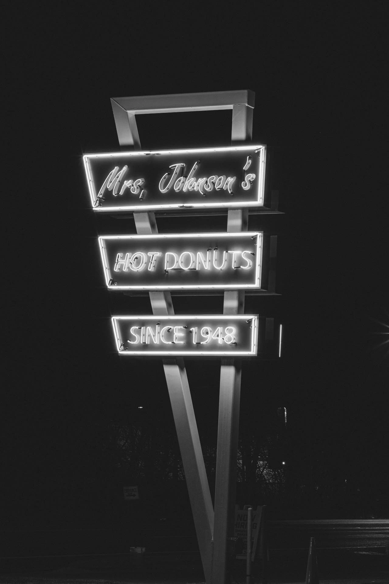 mrs Johnsons hot donuts neon sign in Austin Texas at night