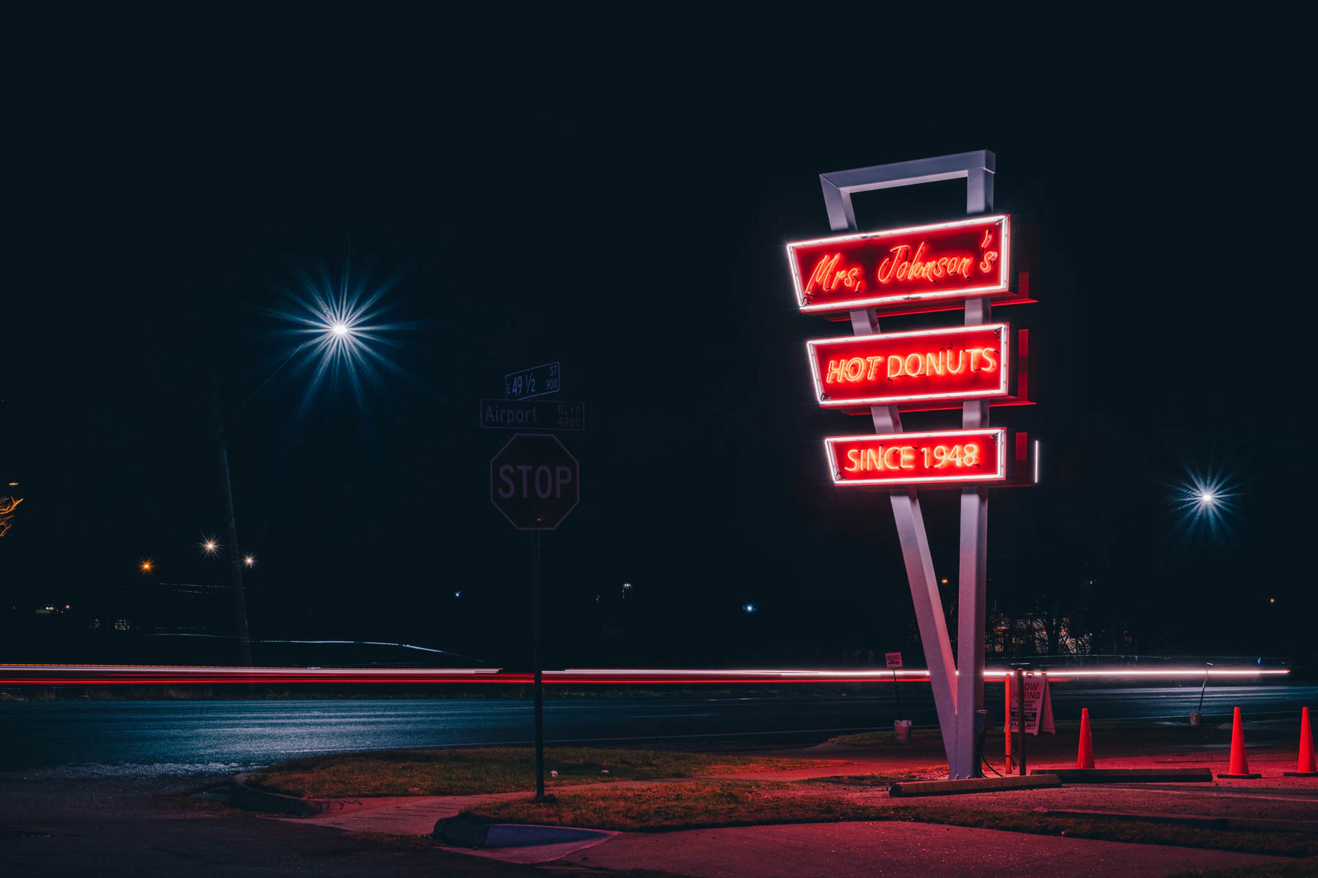 mrs Johnsons hot donuts neon sign in Austin Texas at night