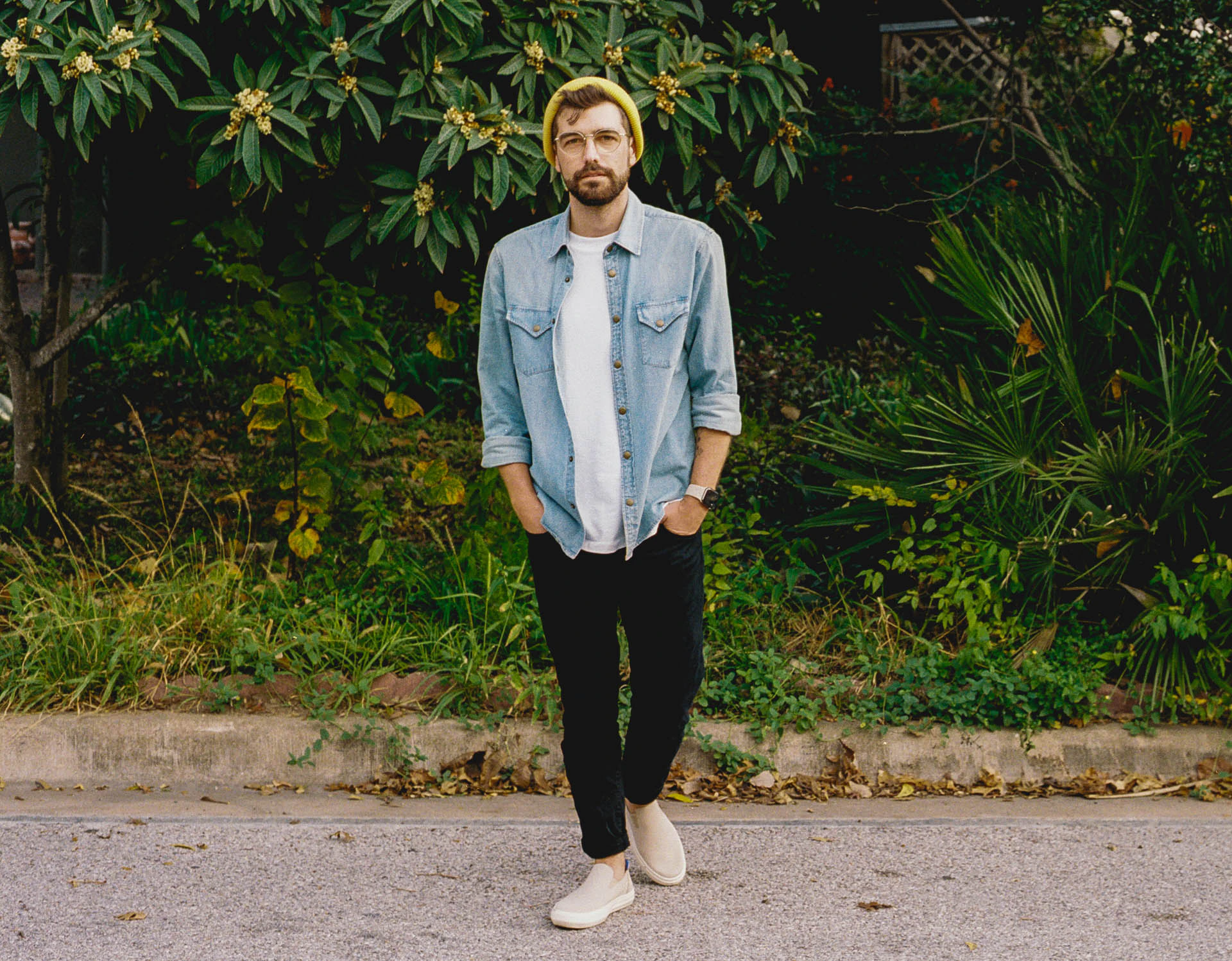 Jonathan Grado in yellow beanie and blue denim shirt in Austin, texas on film