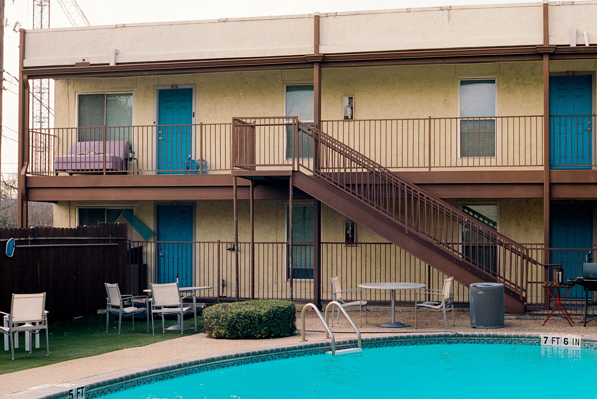 old motel with pool on film