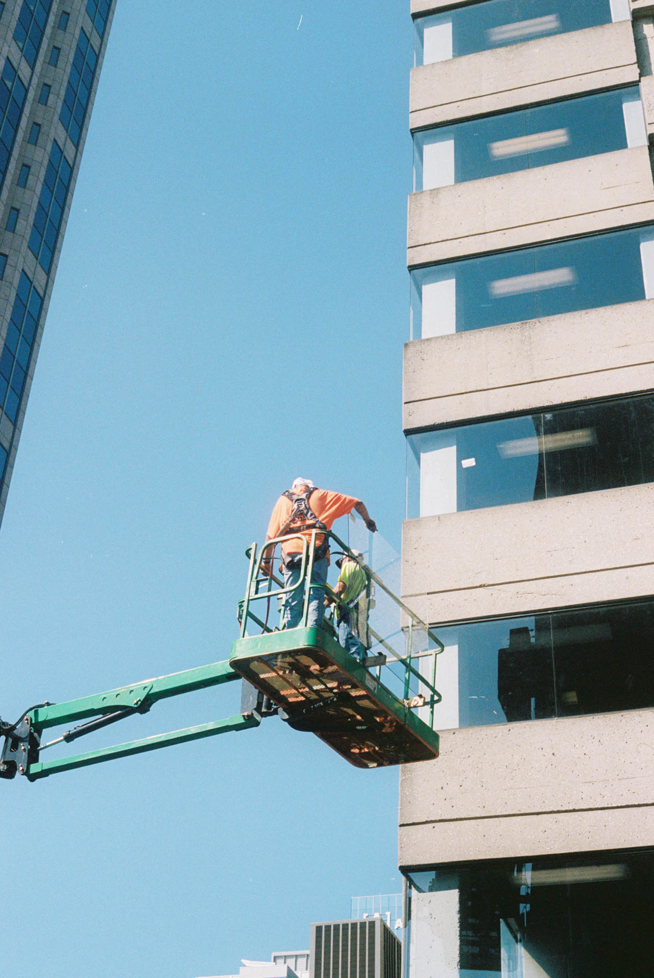 workers in a cherry picker in Nashville on film