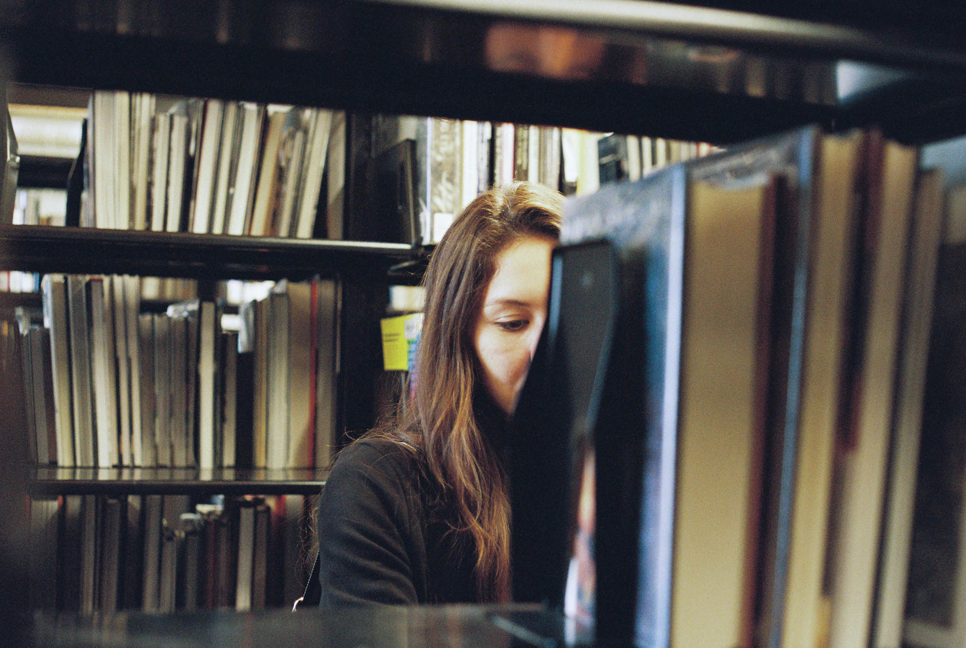 woman in Austin public library on film