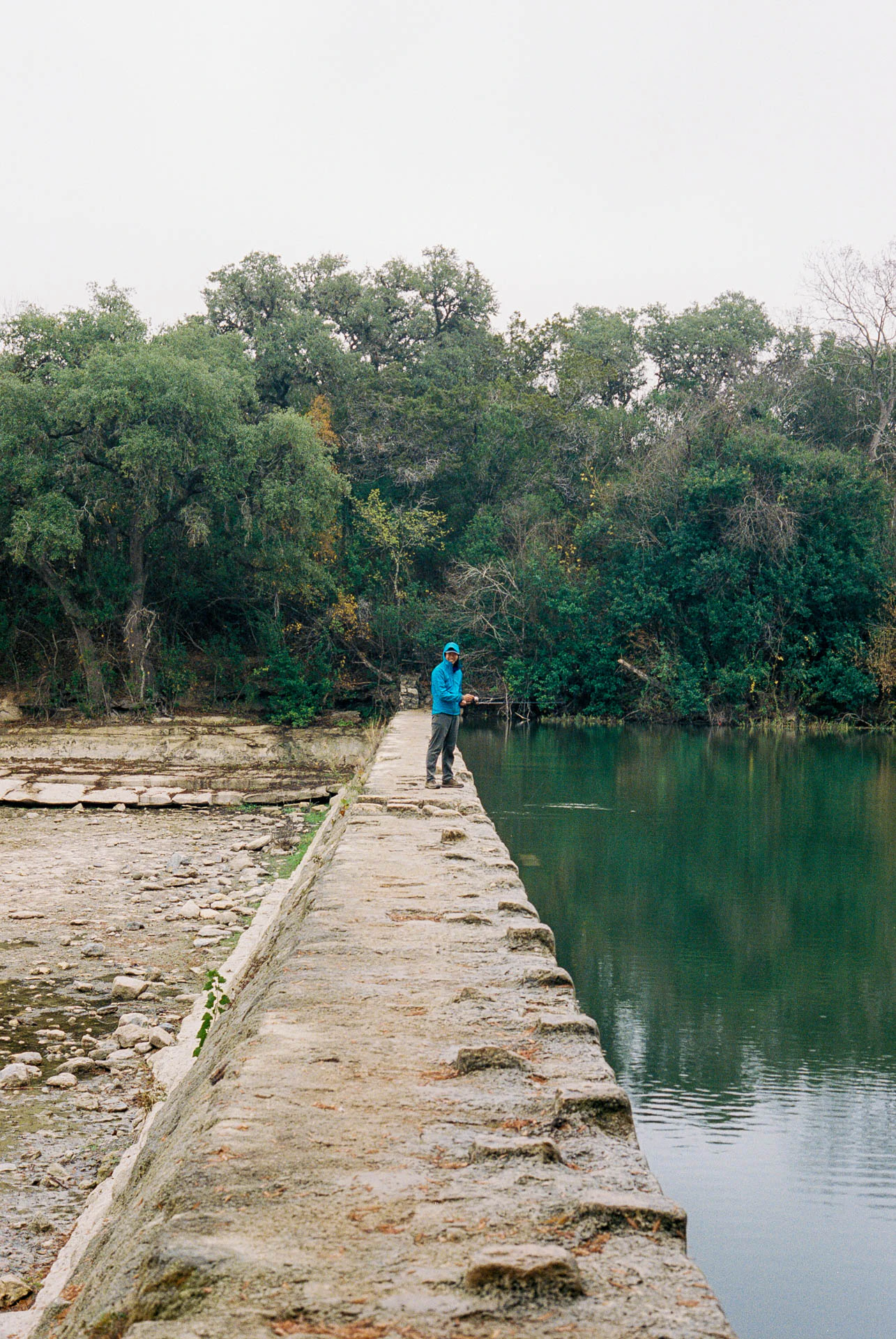 man on jetty in texas on film