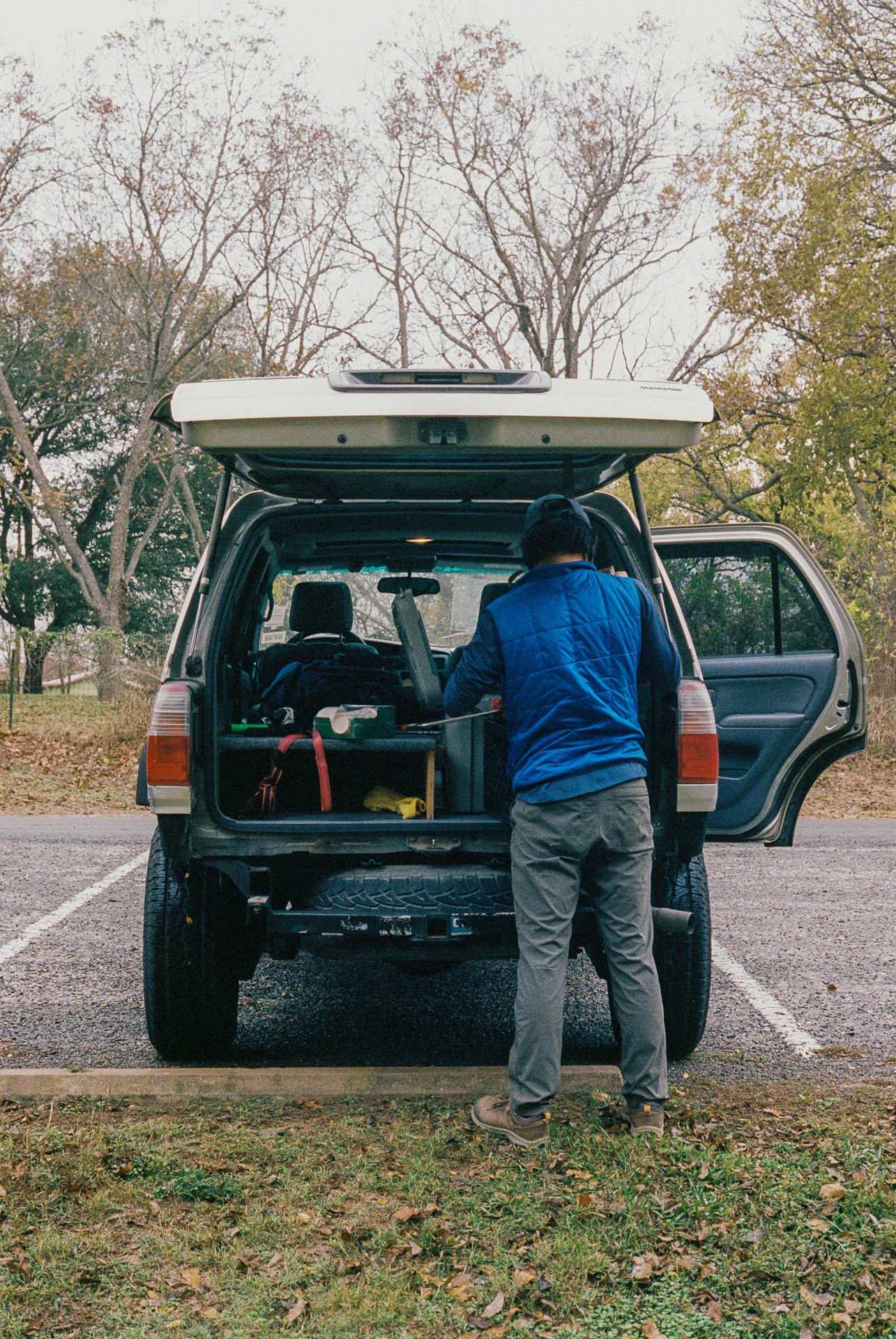 man with fishing equipment in Austin on film