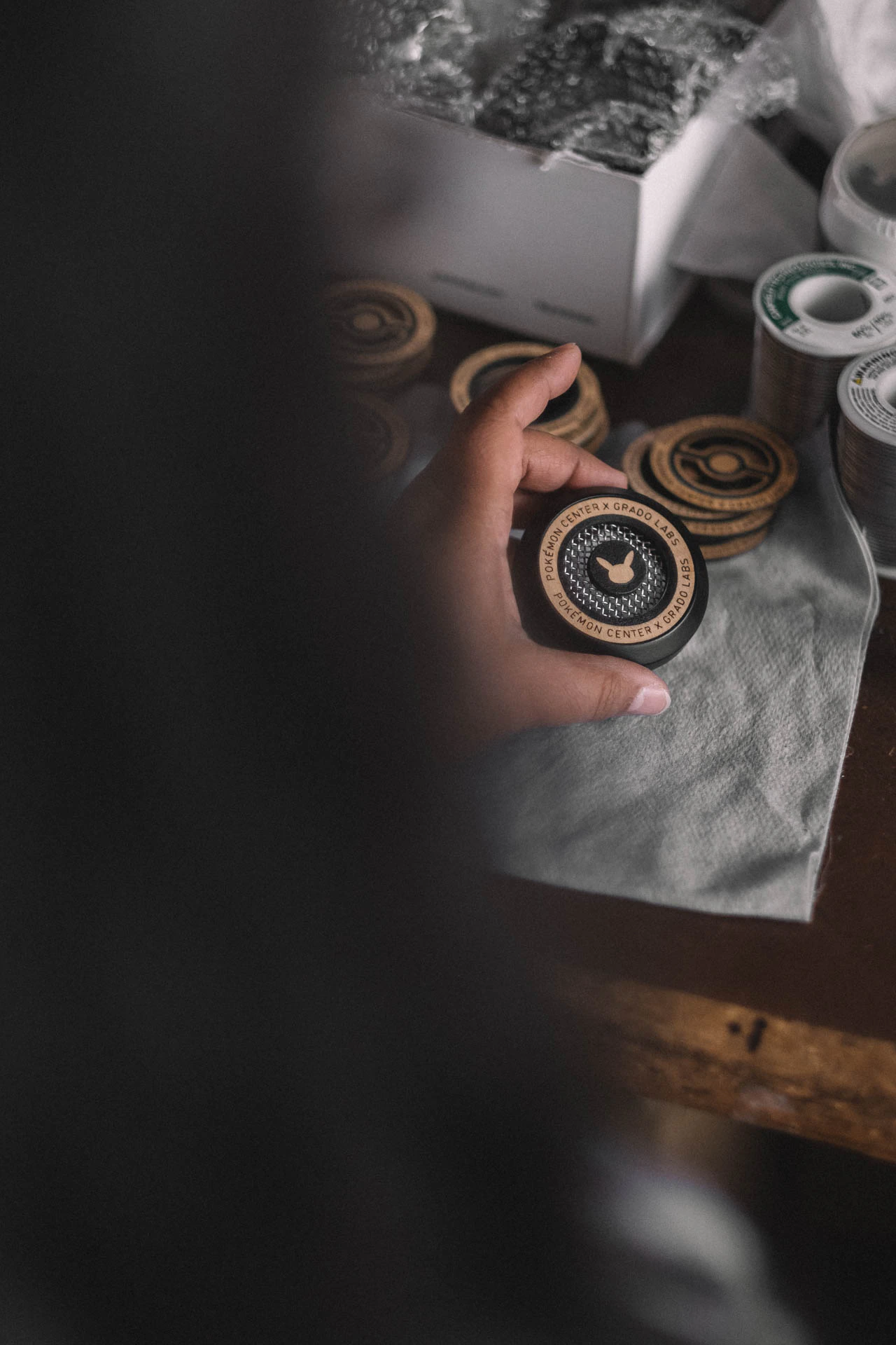 Grado Labs Pokémon metal headphones on the workbench